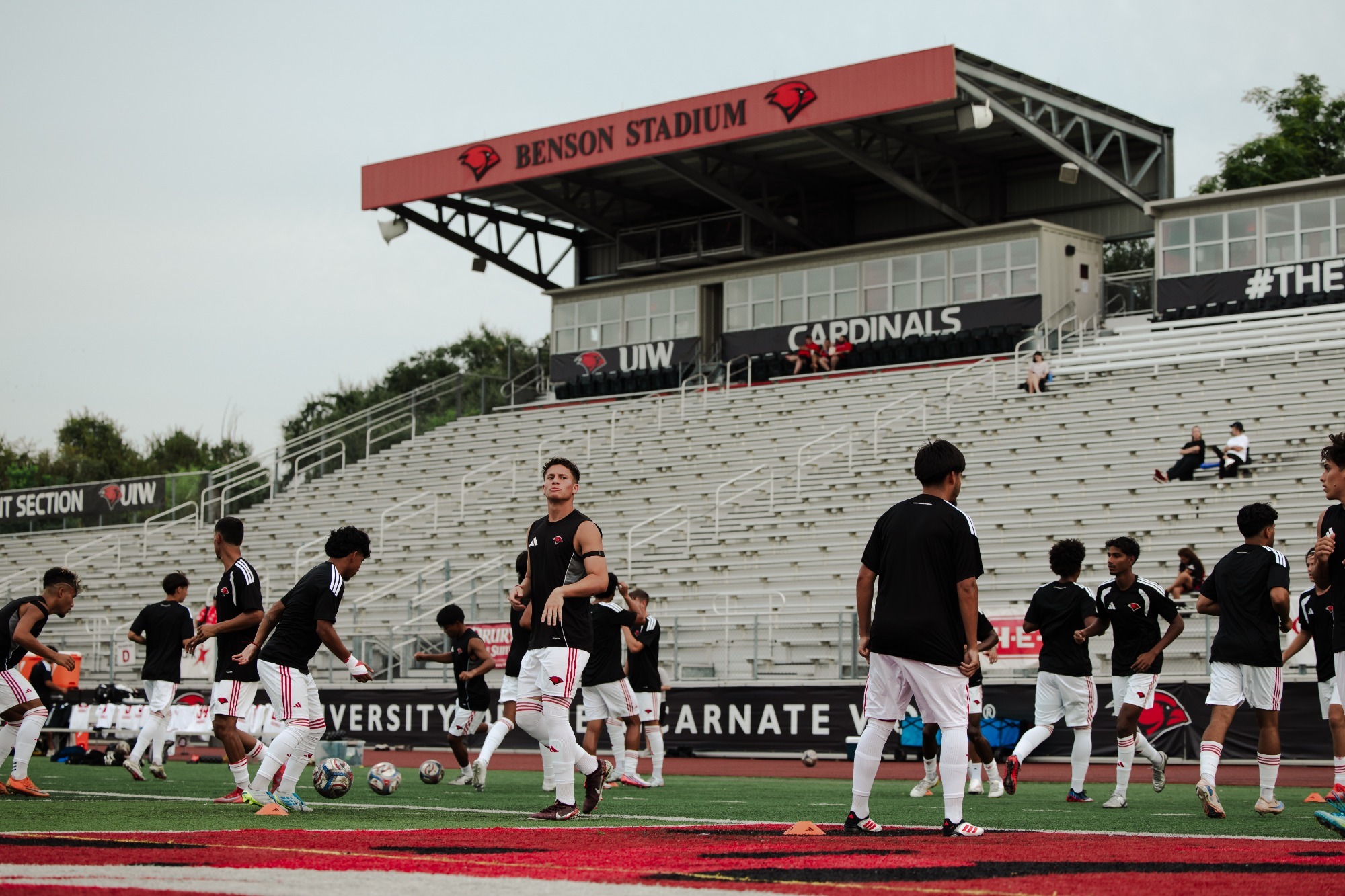 Men's Soccer warms up at Benson