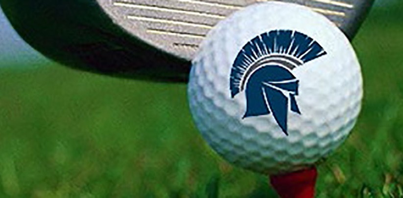Golf ball on a tee with a Spartan logo