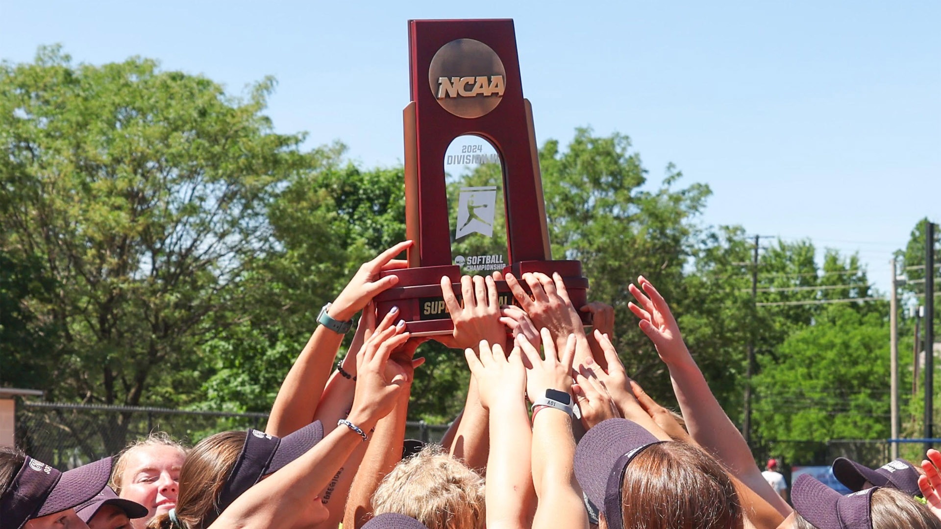 the 2024 NCAA Division III Softball Super Regional trophy held aloft by the CWRU Softball team