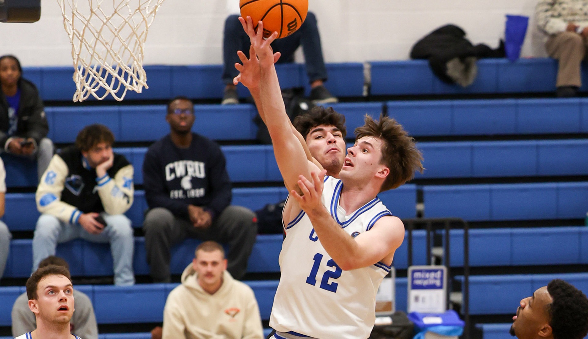 Matthew Ellis making a layup against Carnegie Mellon