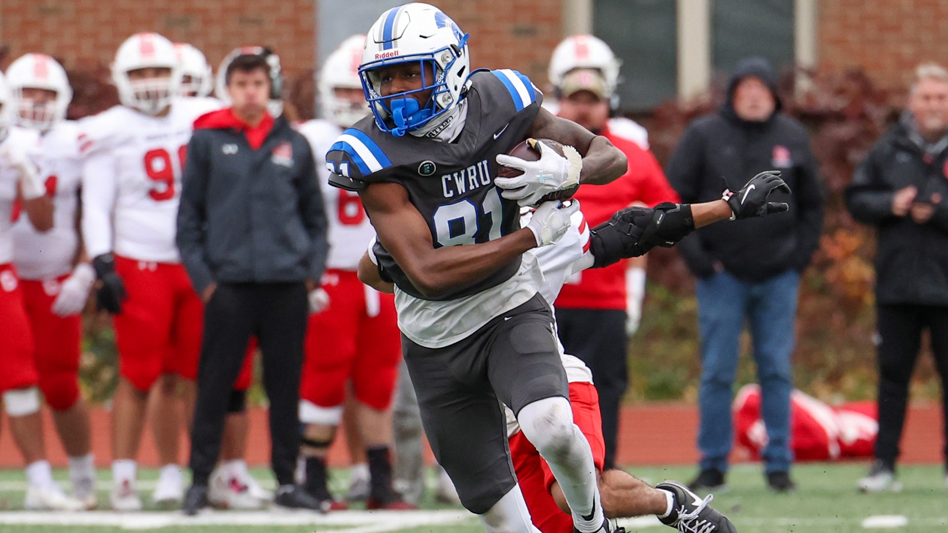 Brian Caldwell Jr. running with the ball after a catch against Grove City