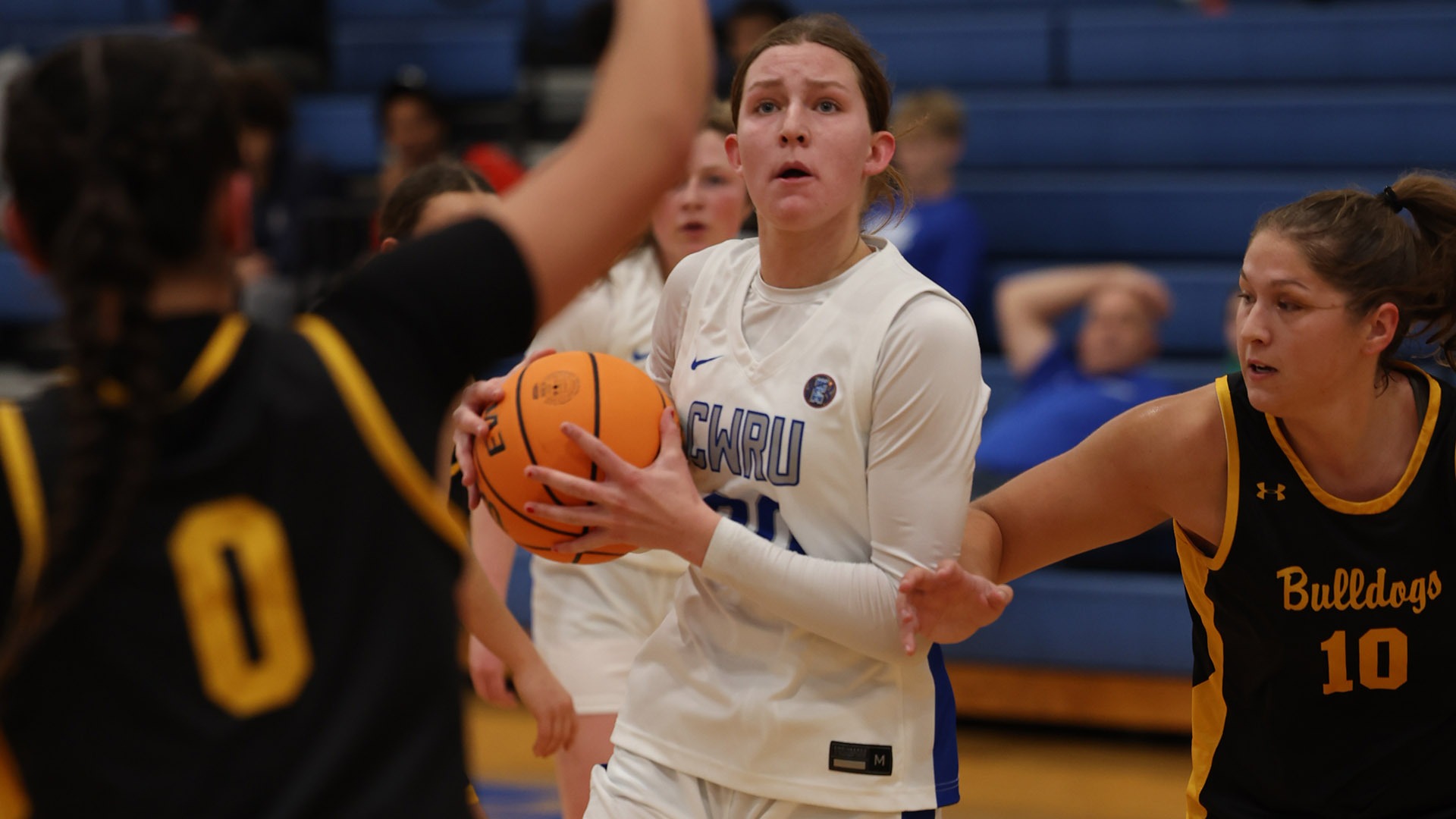 Maura Schorr driving to the hoop against Adrian
