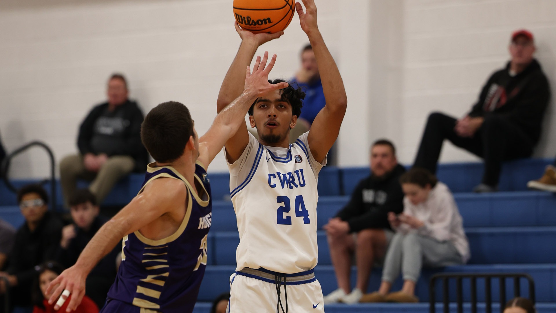 Shyam Patel shooting a three-pointer against Houghton