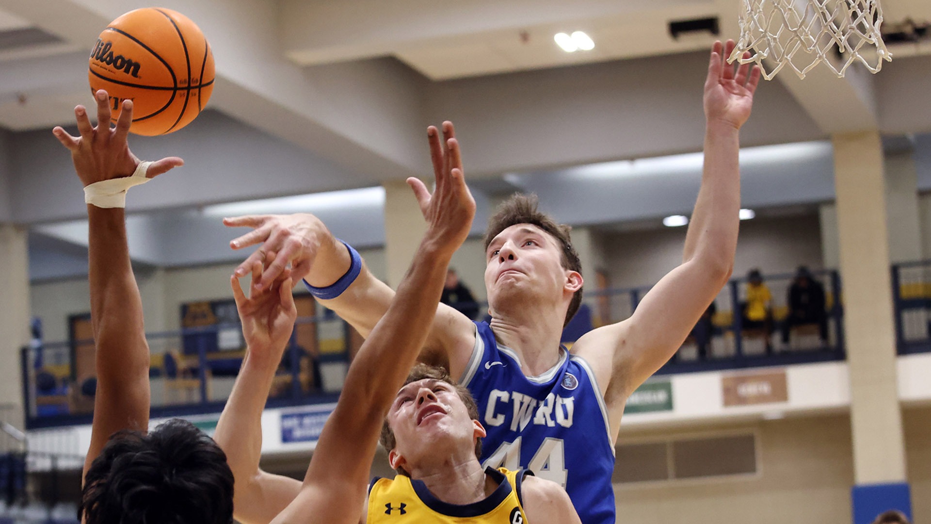 Andrew Fox blocking a shot against Allegheny