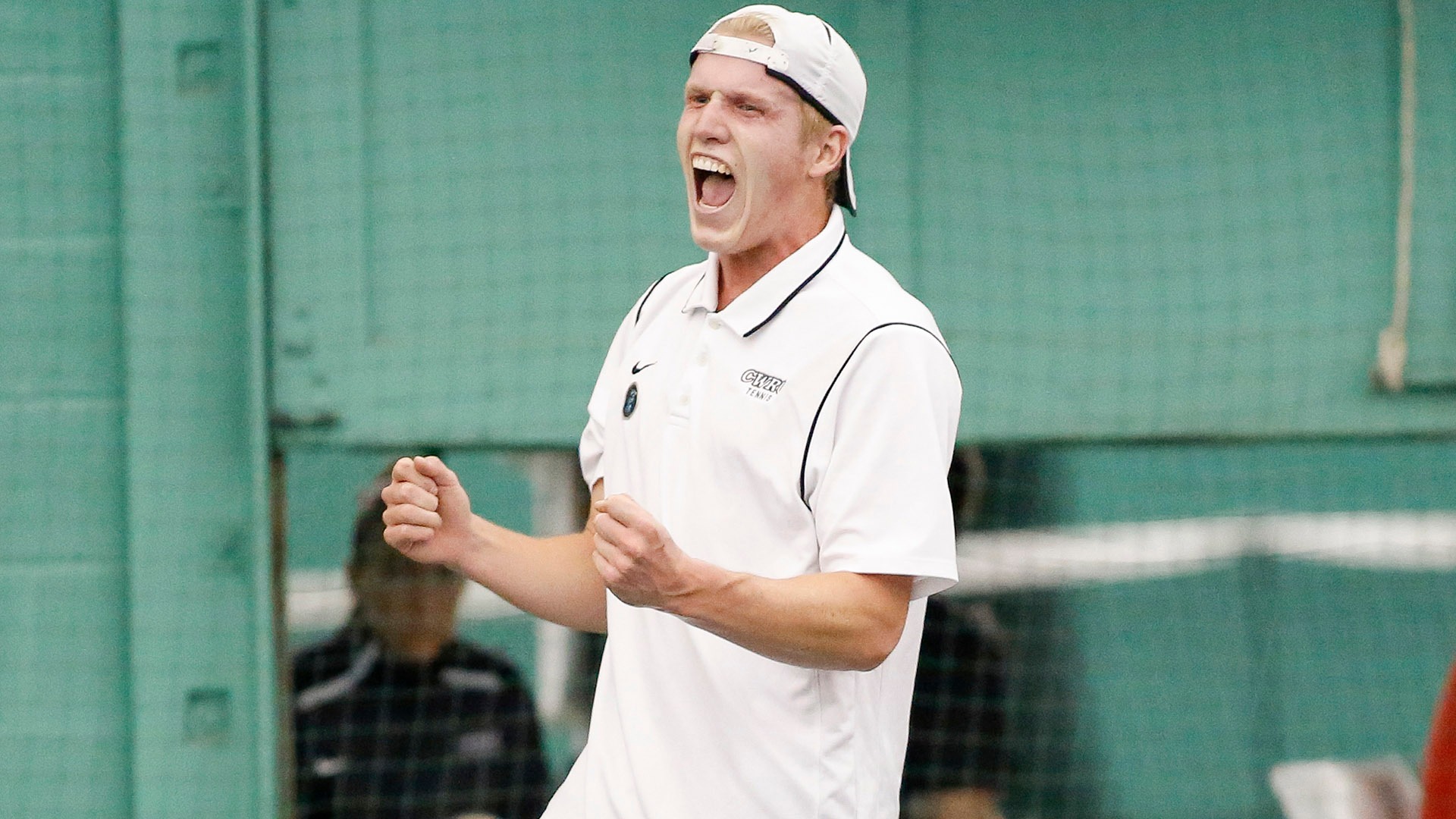 CJ Krimbill celebrating after winning a match