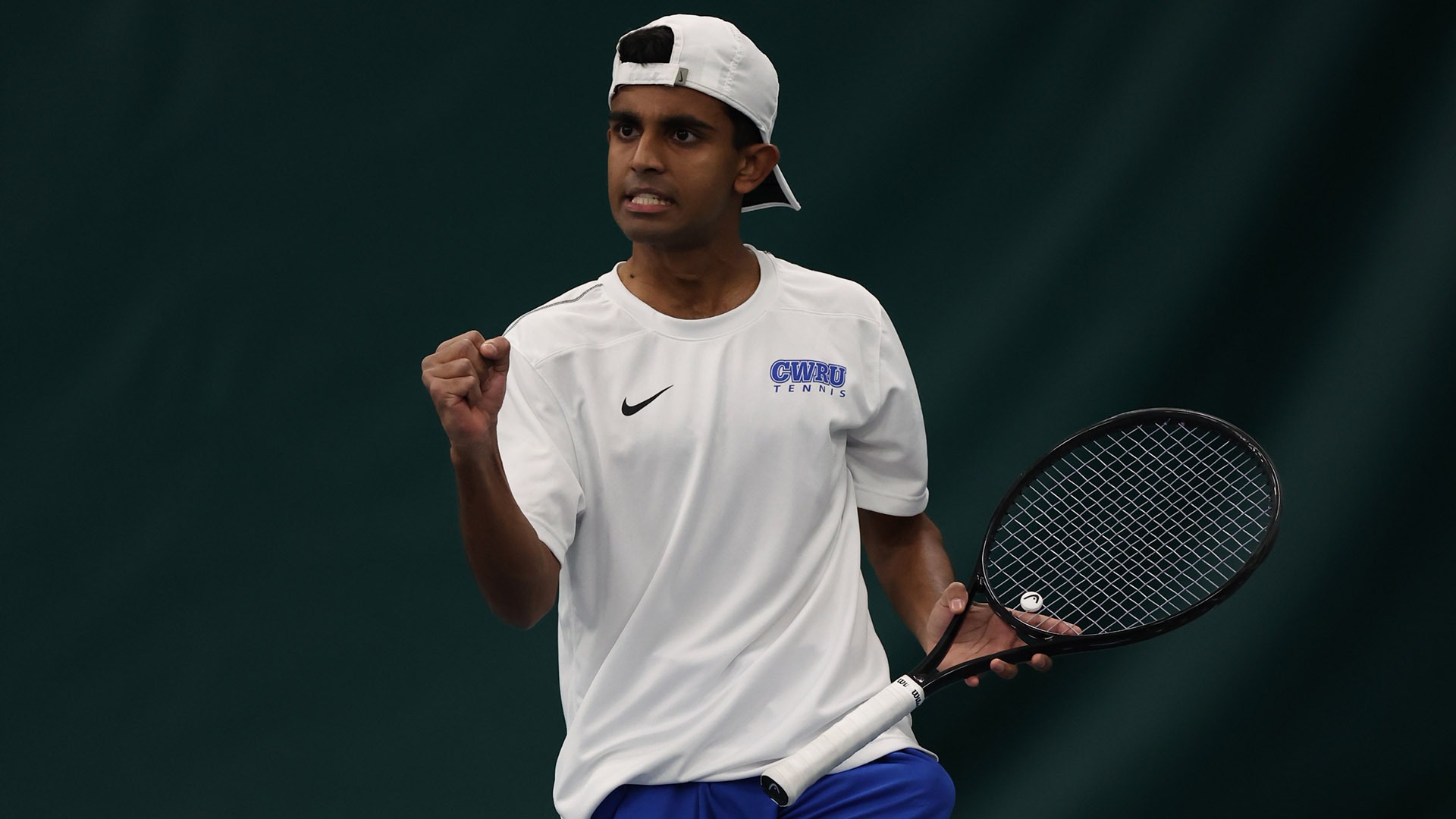 Anmay Devaraj pumping his first after scoring a point