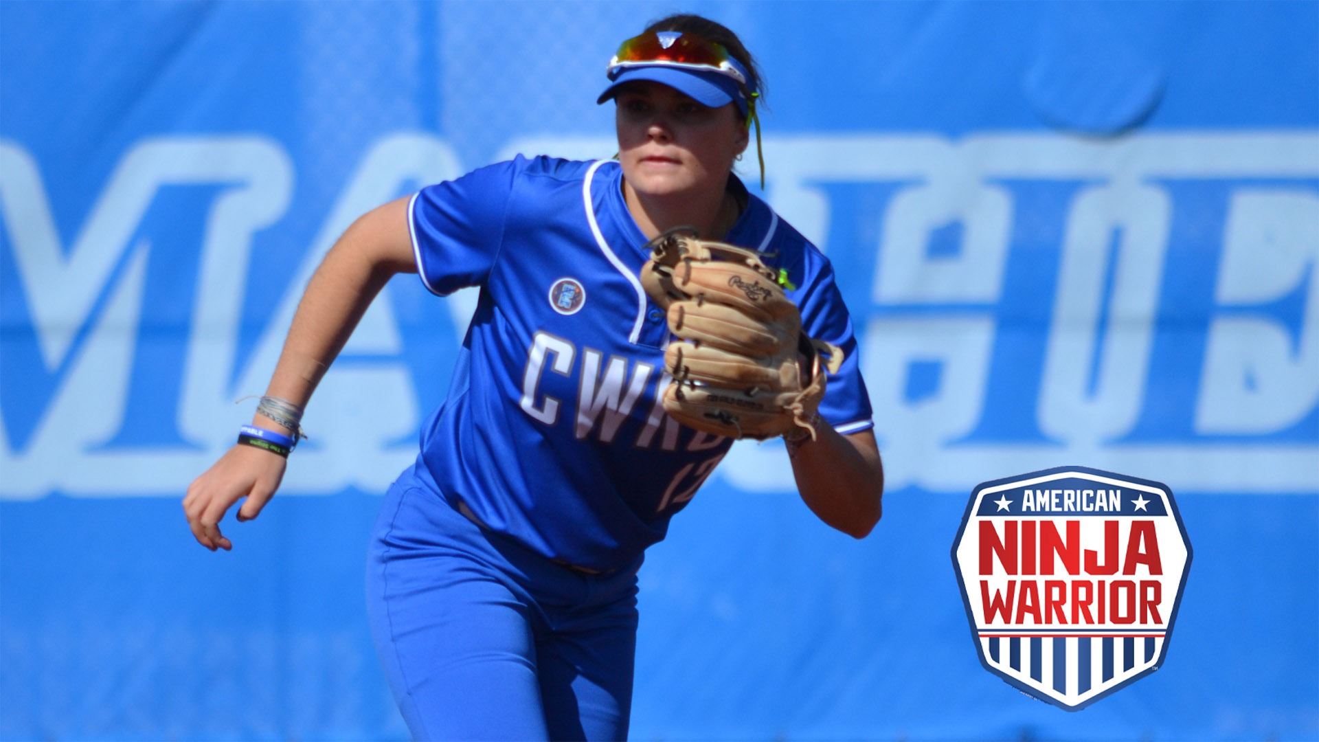 Karen Potts running to field a ball with the American Ninja Warrior logo in bottom right corner