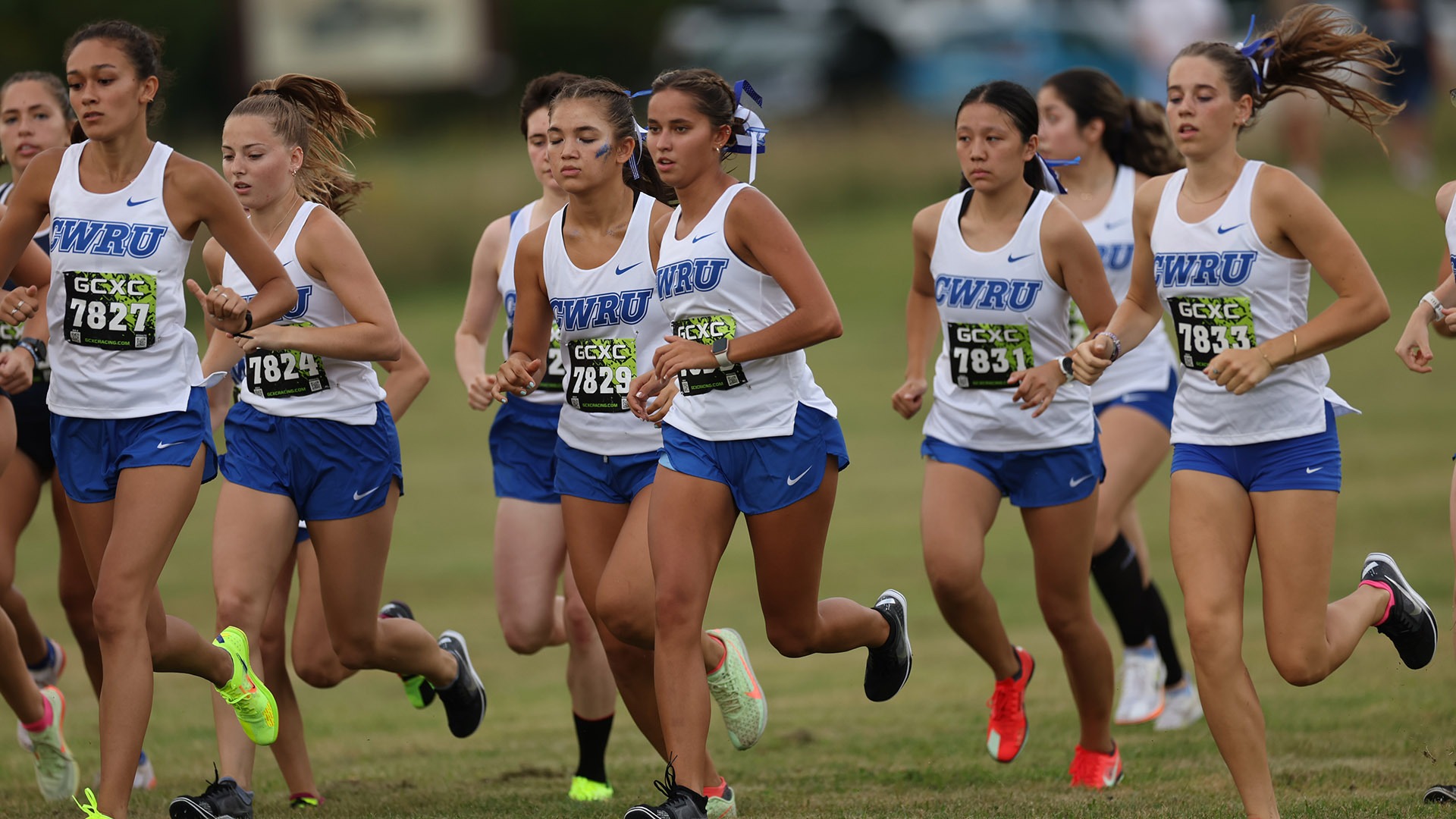 The CWRU women's cross country running in a pack at the Sudeck Classic