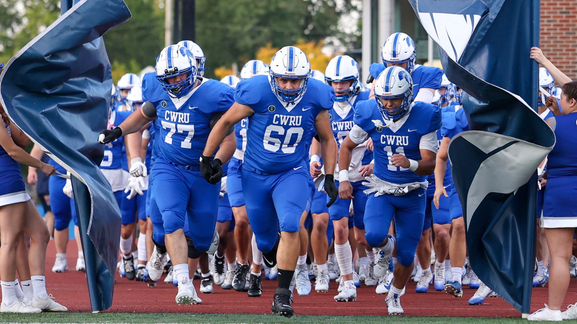 The team entering the field against Westminster