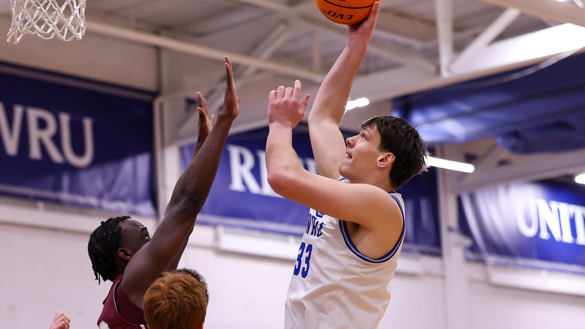 Alex Vincent attempting a hook shot against Chicago