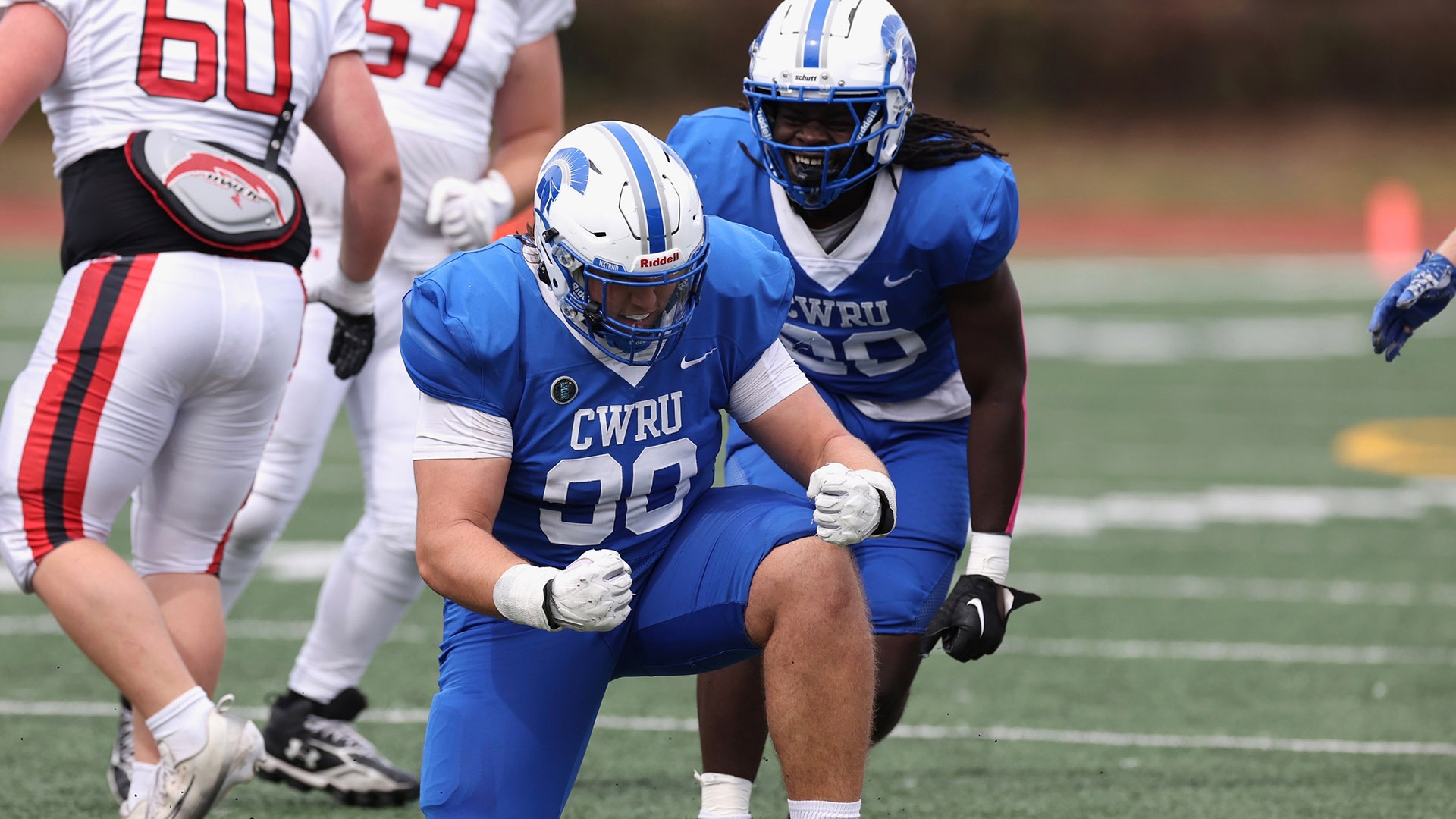 Tabor Tackett celebrates a sack against Saint Francis
