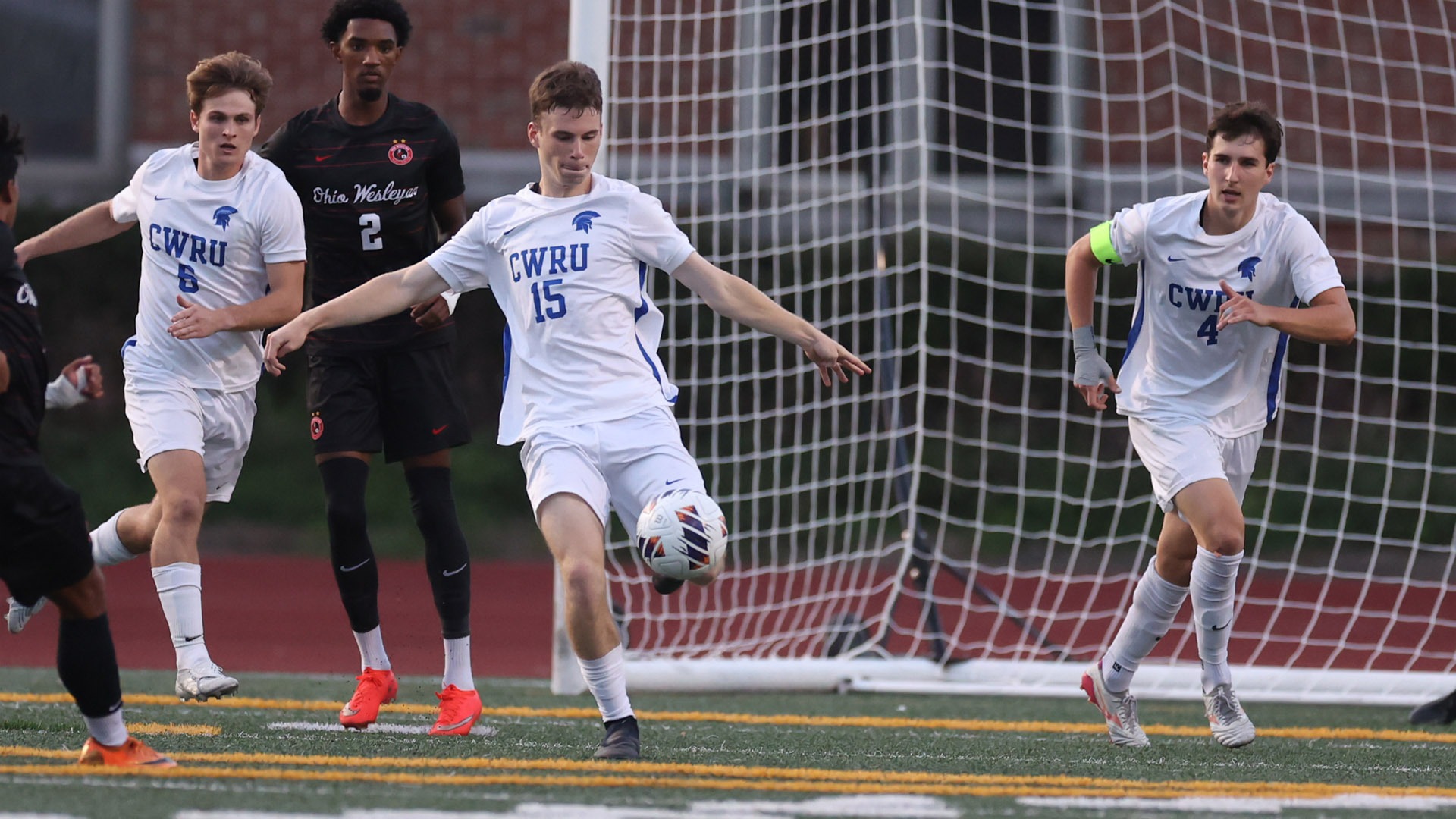Mitchell Fein about to kick the ball with his left foot against OWU