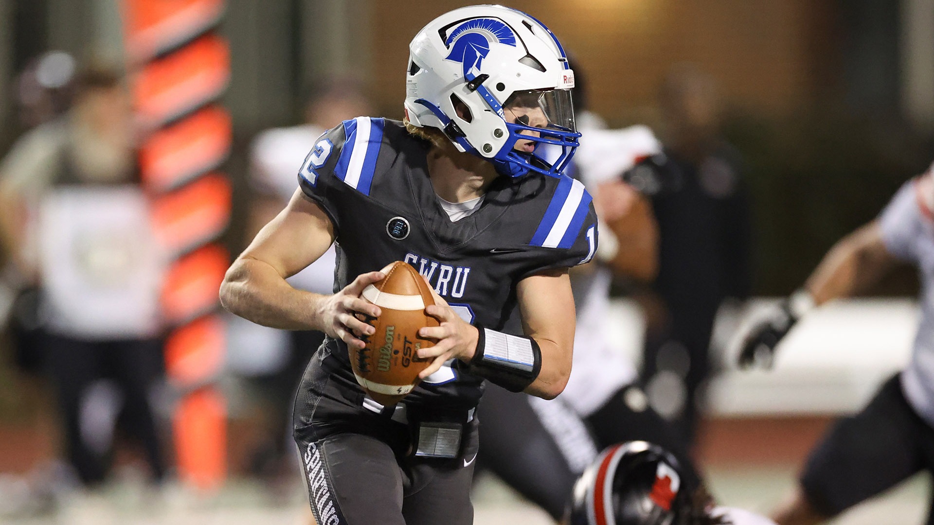 Sam DeTillio running with the ball against Washington & Jefferson