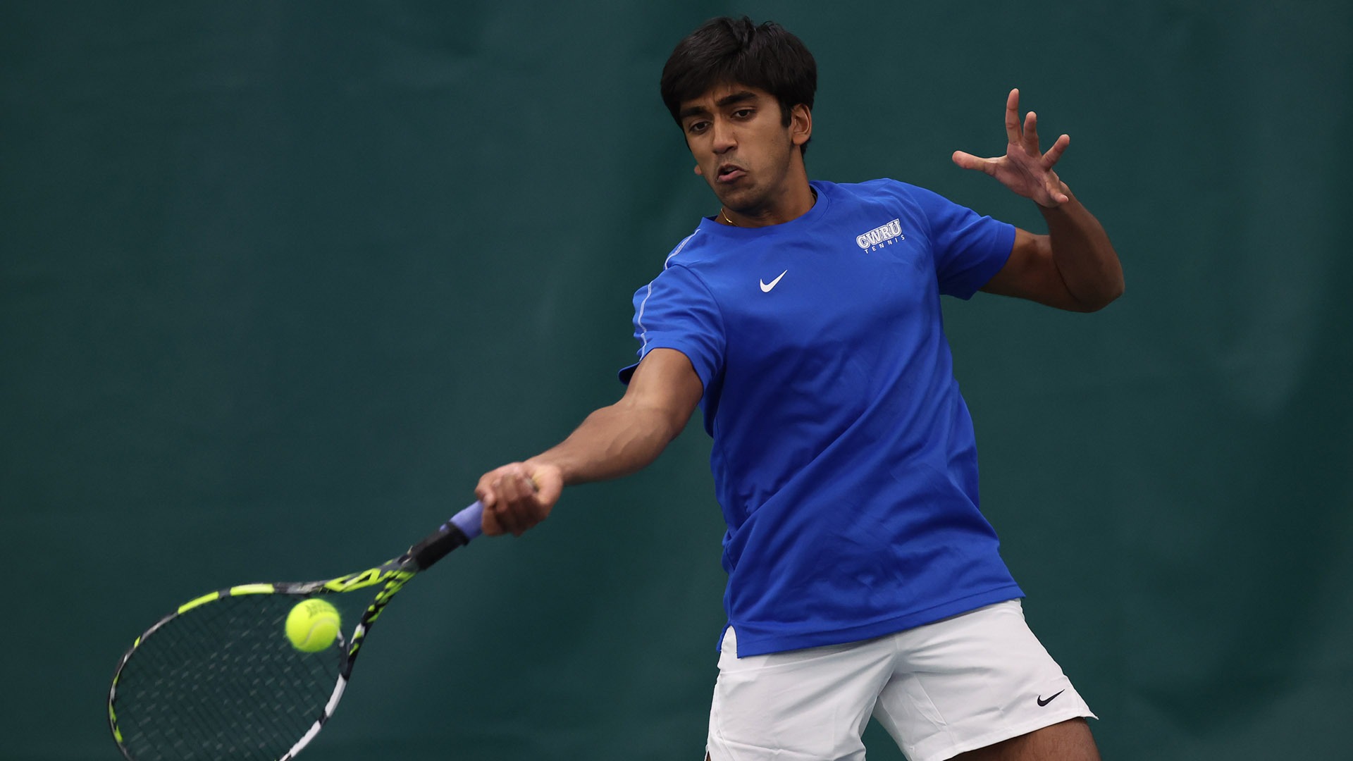 Rohit Jain hits a forehand shot