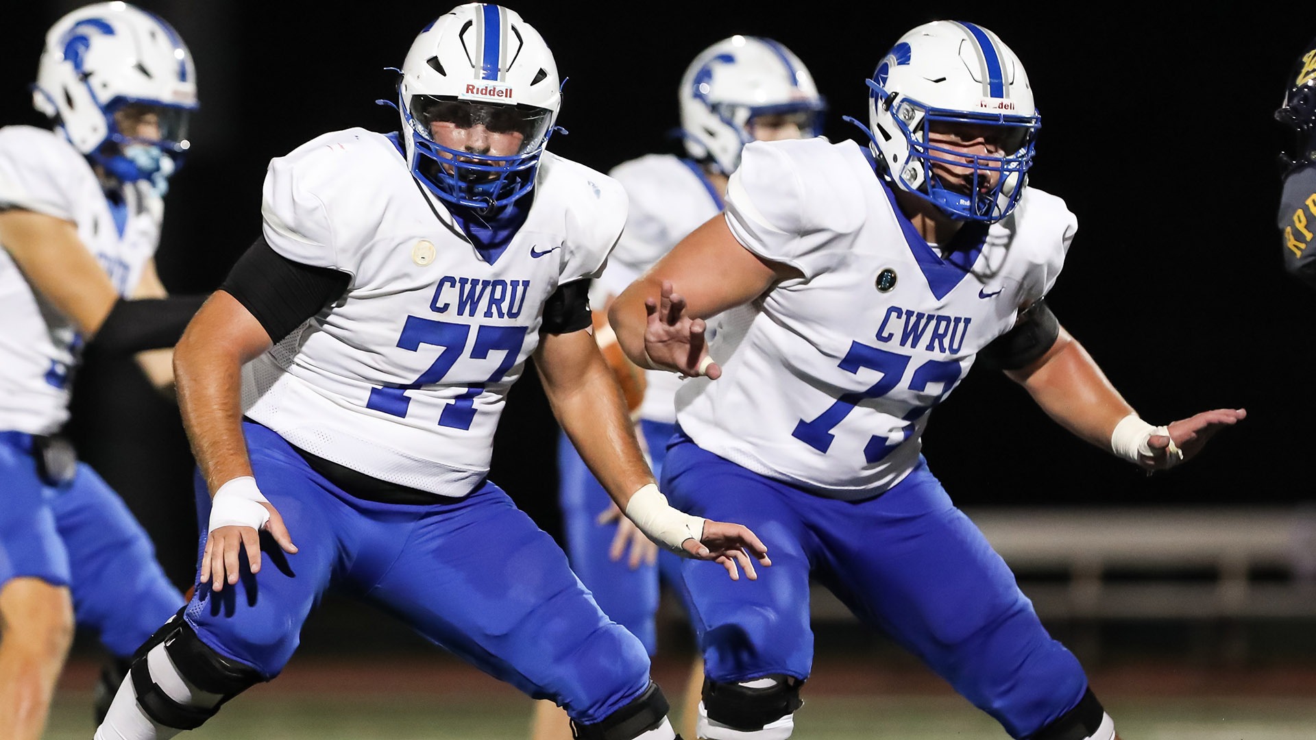 Sean DiDona (left) and Brock Gillespie (right) block against Rochester