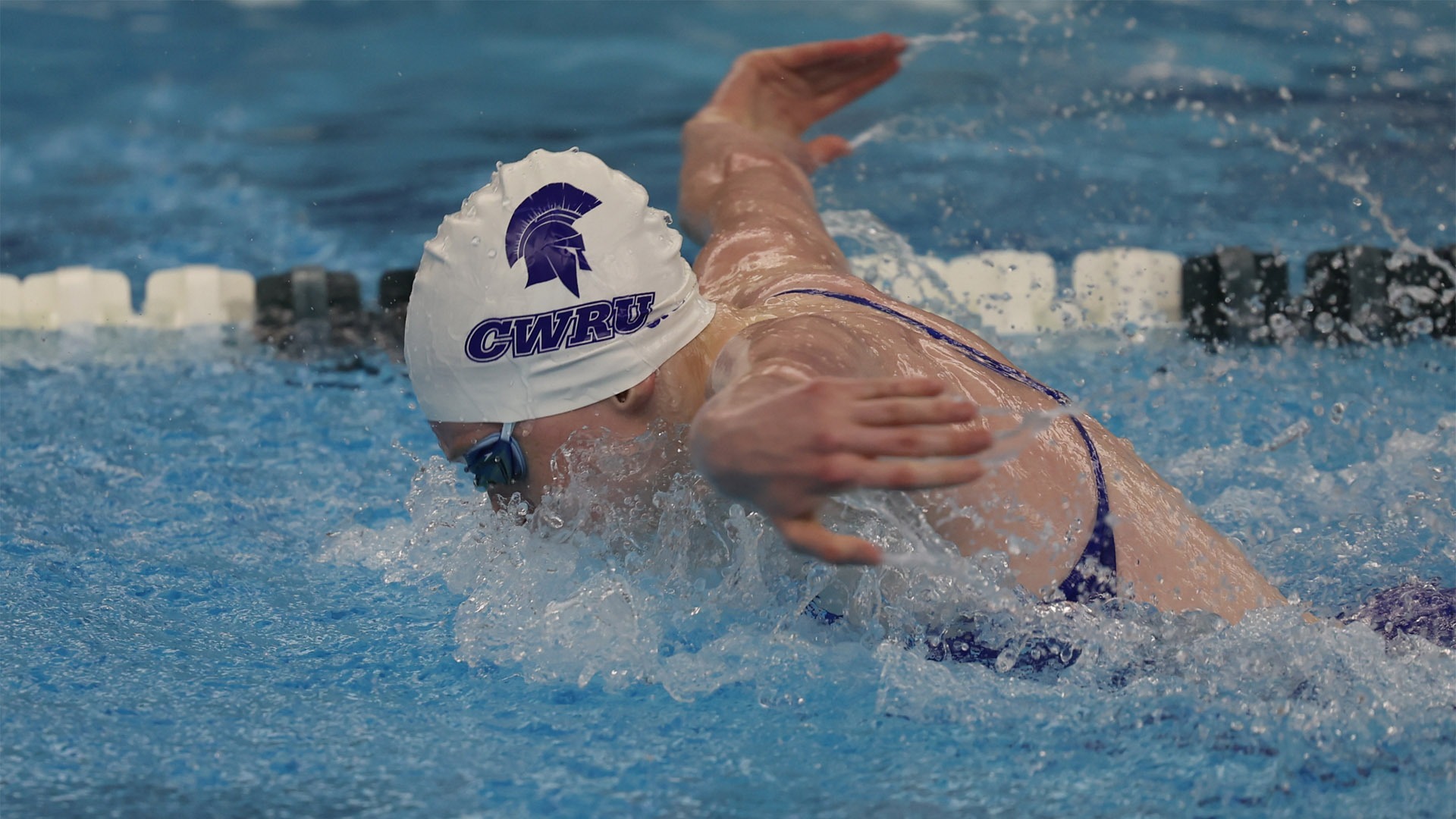 Claire Kozma swimming the butterfly