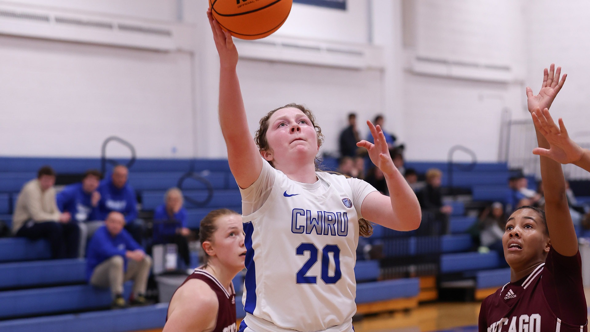 Mya Hartjes attempts a layup against UChicago