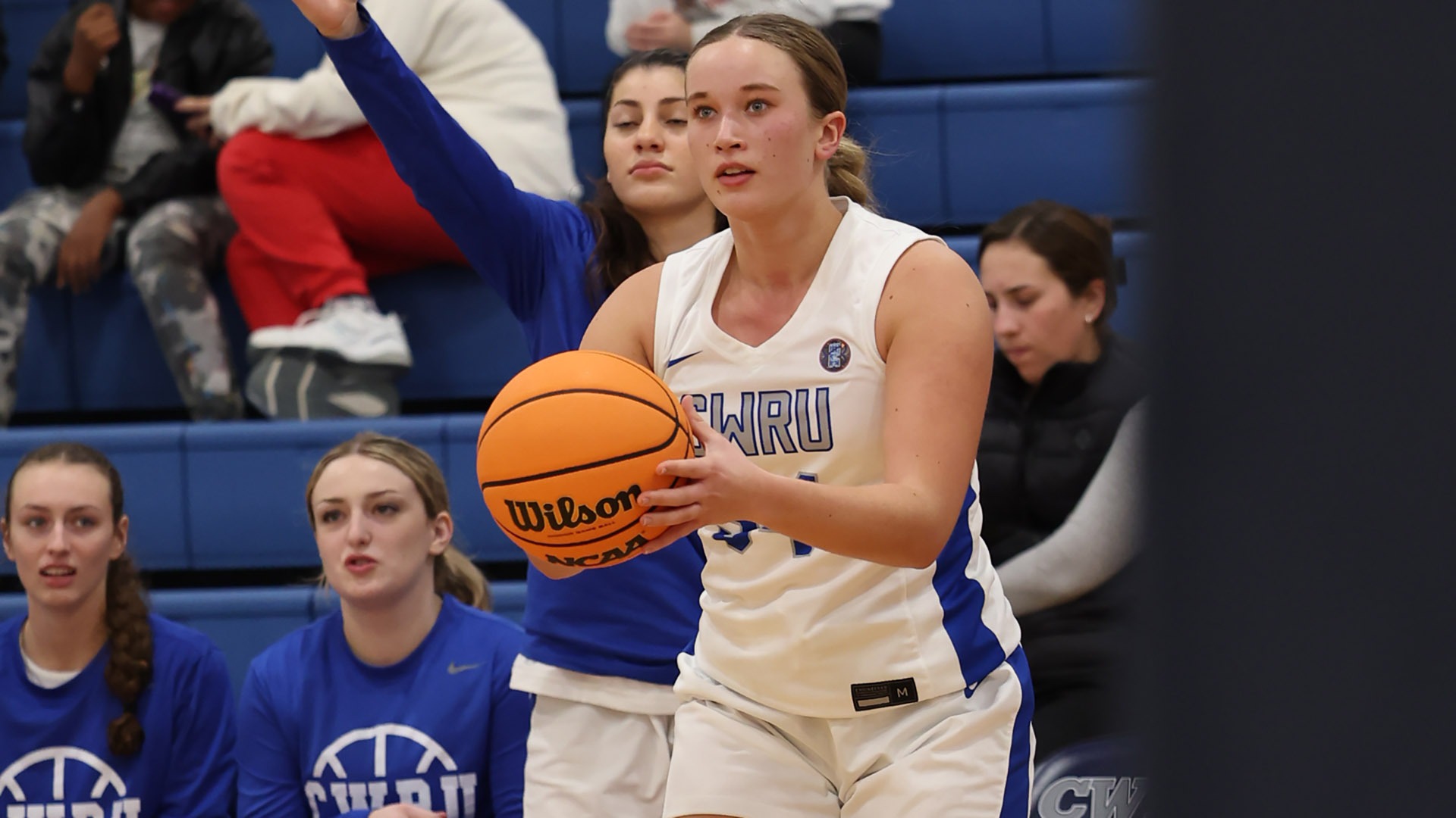 Taylor Angielski shooting a three against Adrian