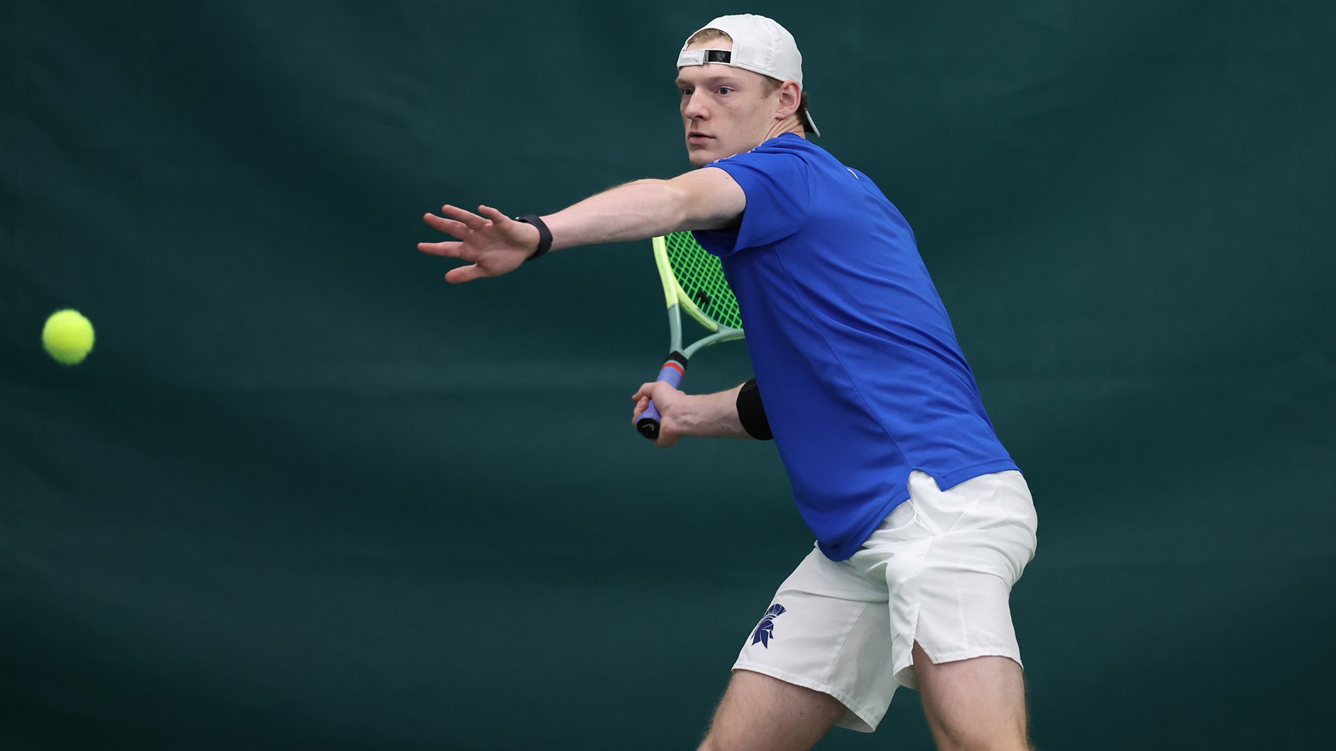 Trey Lambright hits a forehand against Rochester