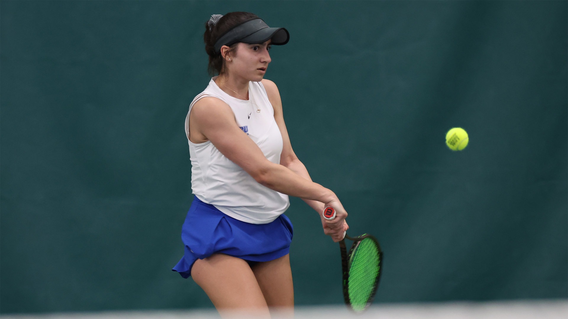 Atra Biria about to hit a backhanded shot