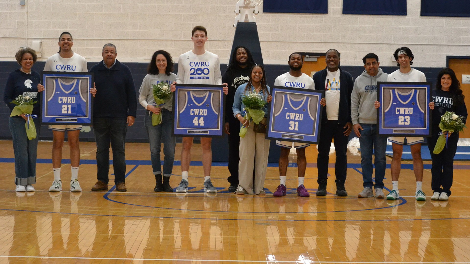 The CWRU men's basketball 2026 senior class with their families