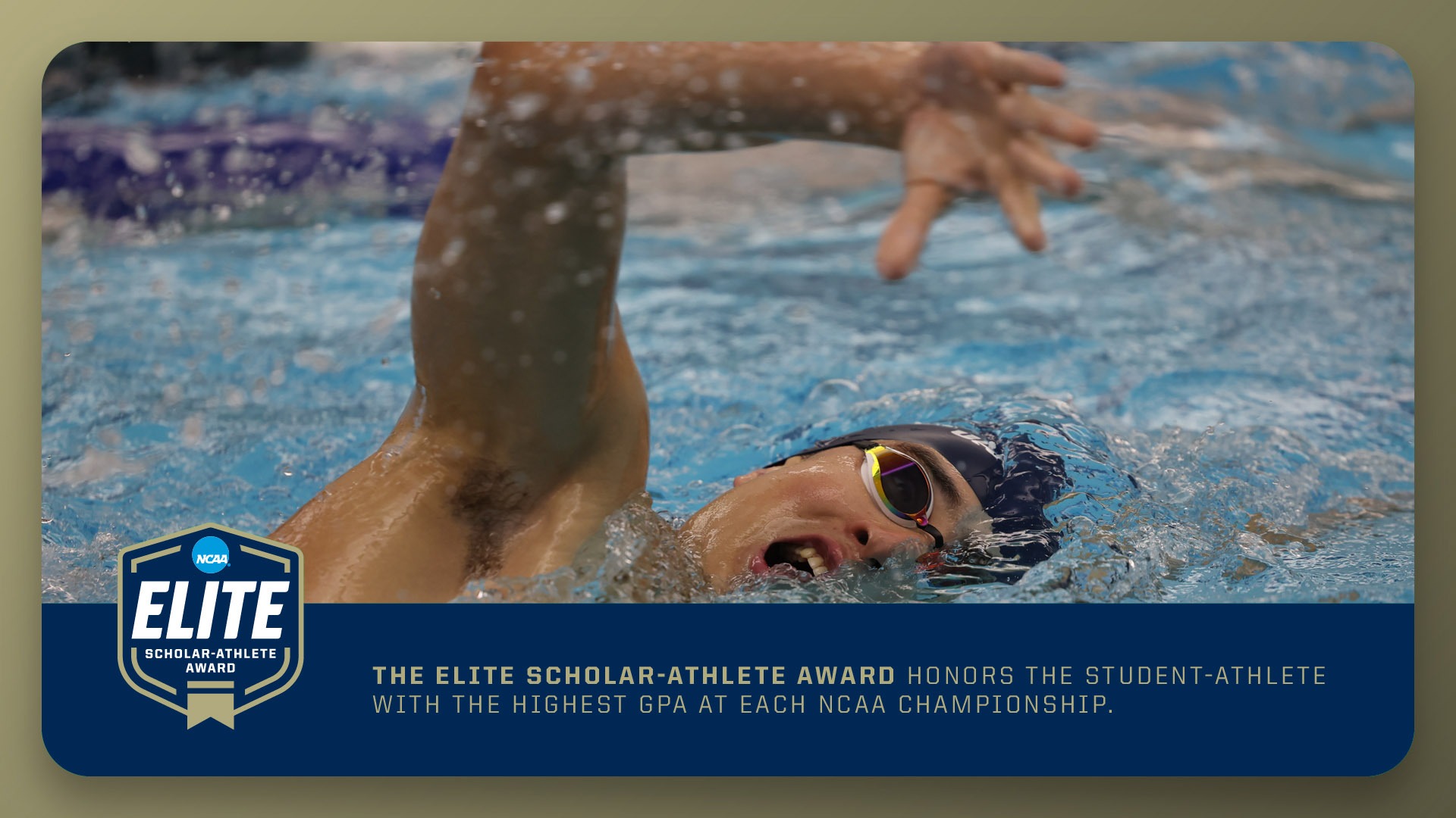 William Froass swimming with the Elite Scholar-Athlete Award banner