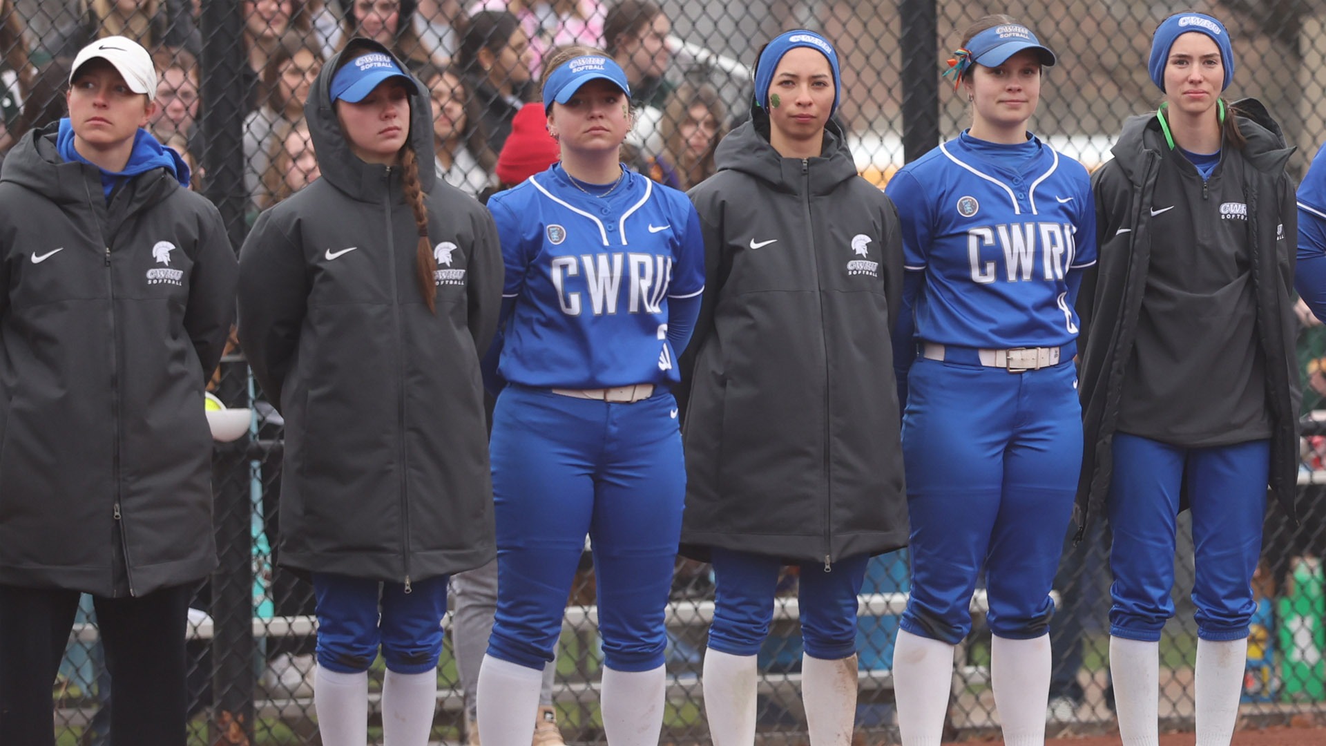 Members of the CWRU softball team lining up before a game against WashU