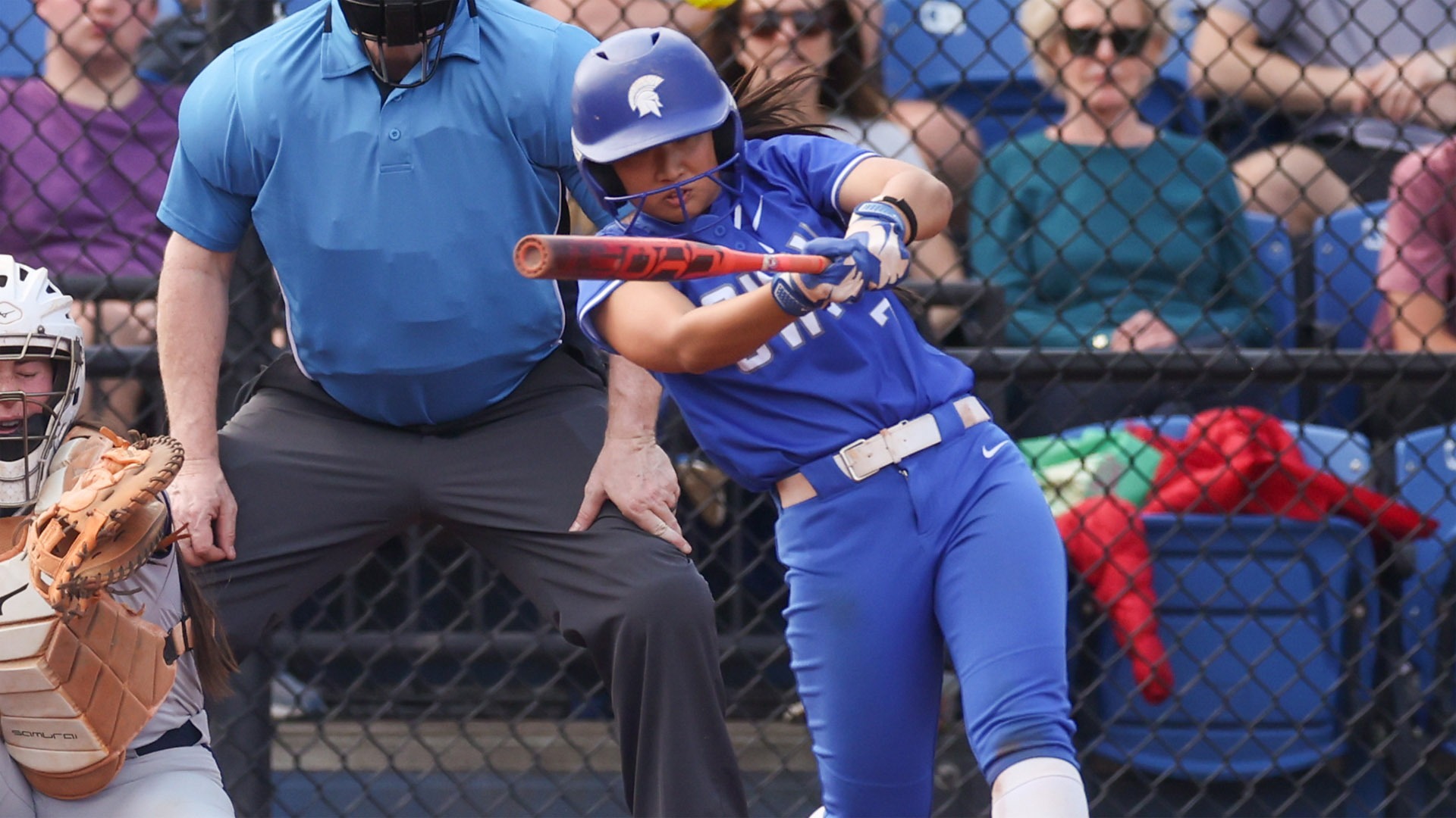 Natalie Ching swinging at a pitch against Emory