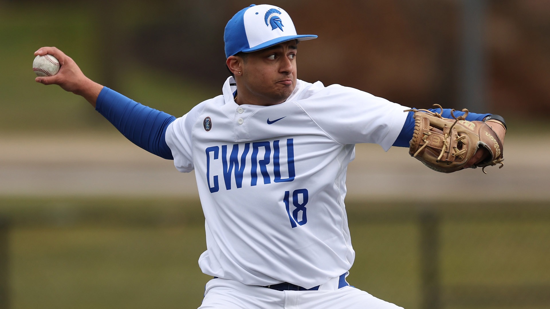 Ayush Shetty throwing a pitch