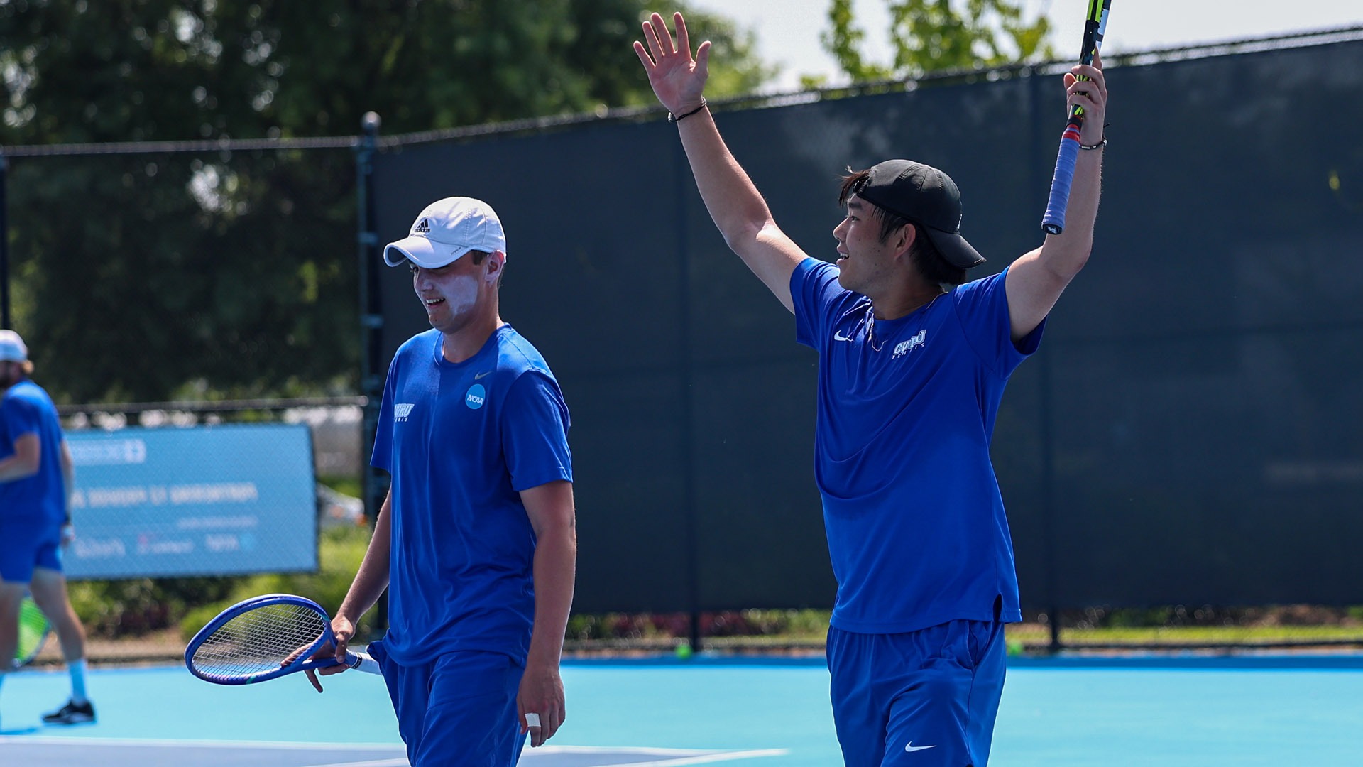 Rowan Matorin & Leon Chen celebrate after winning their doubles match