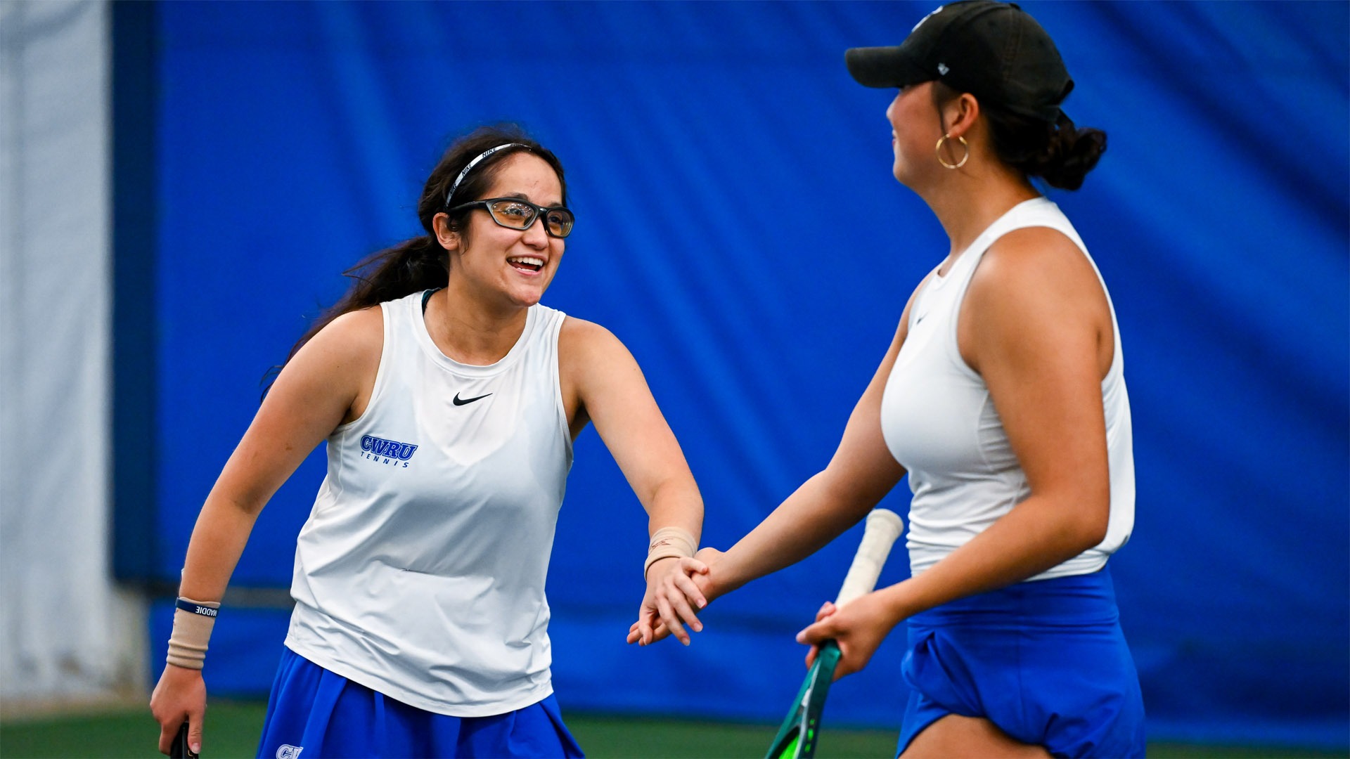 Hannah Kassaie and Katalina Wang after a point at the 2026 NCAA Doubles Championship