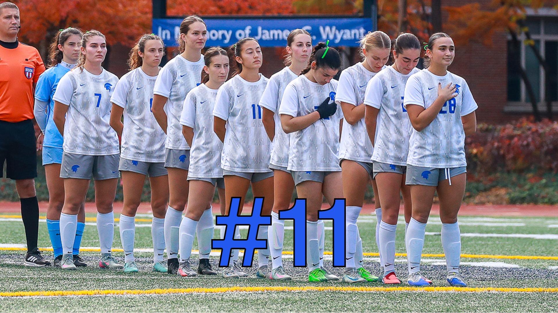 CWRU Women's Soccer Team prior to a game against Emory in 2025 with the #11 in blue text bottom center