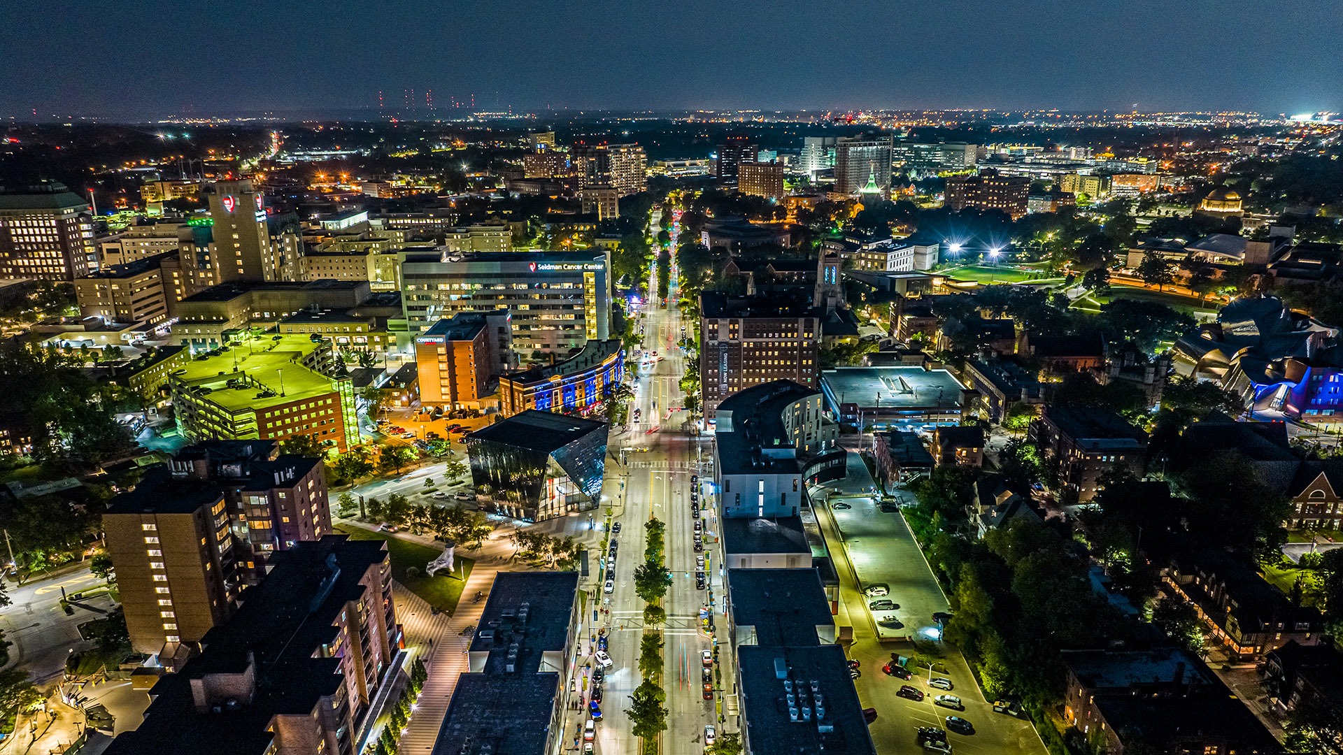 An aerial photo of the CWRU campus at night