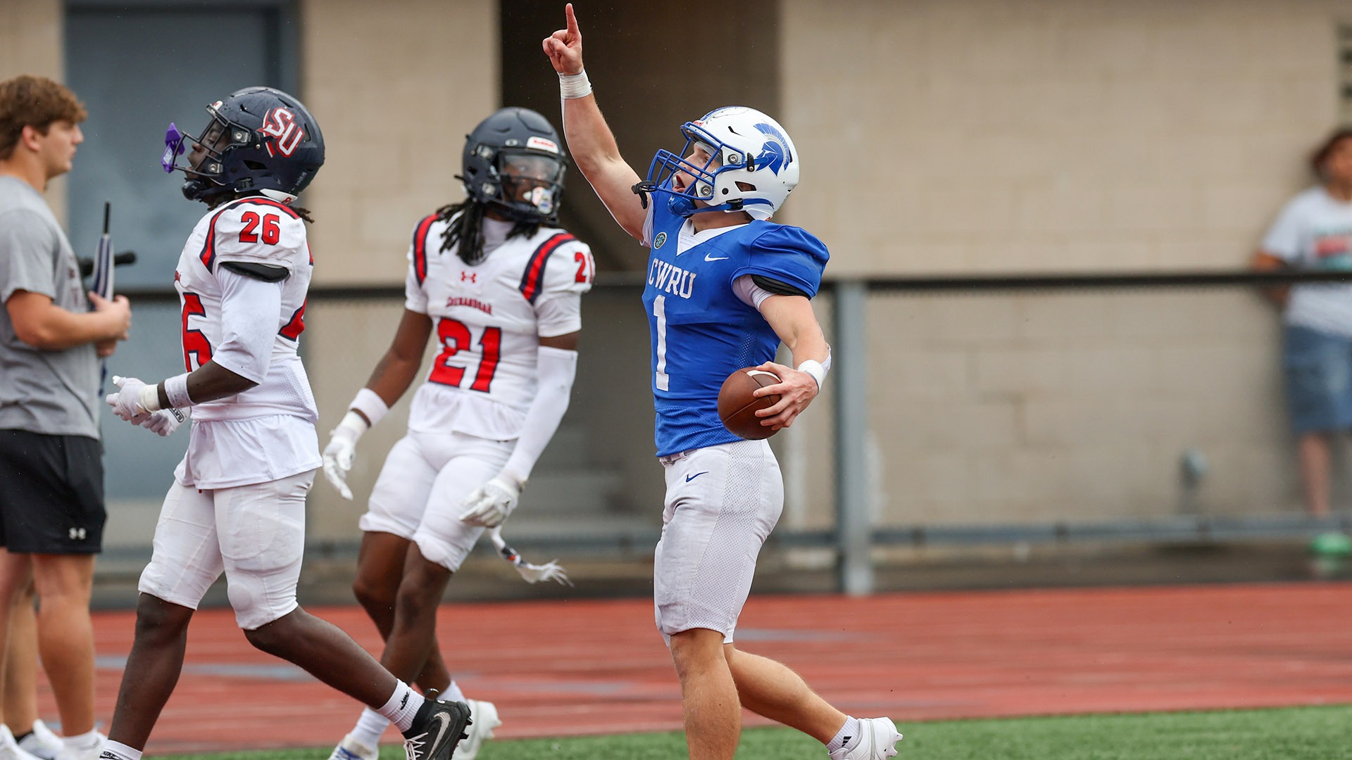 Andy Kavcic celebrates after scoring a touchdown against Shenandoah
