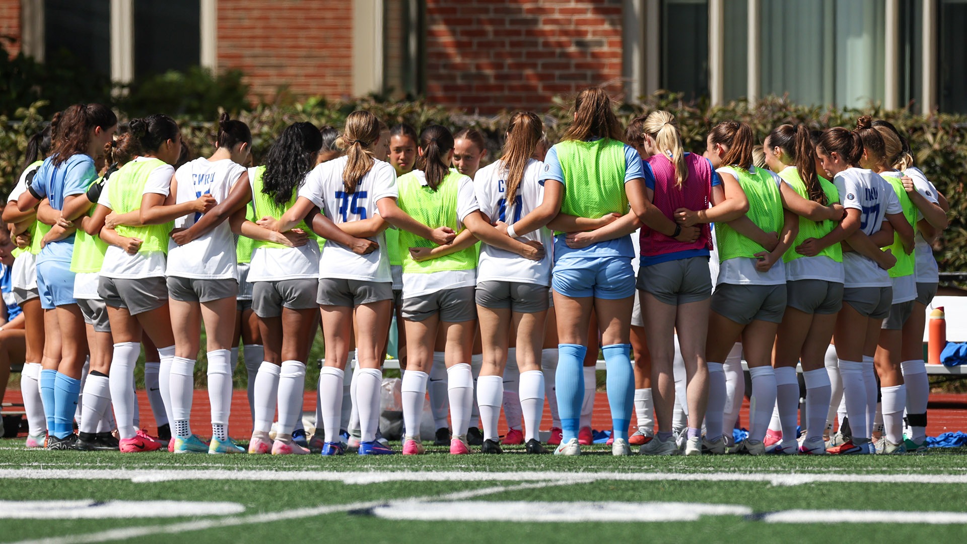 The Spartans huddle before their game against Capital