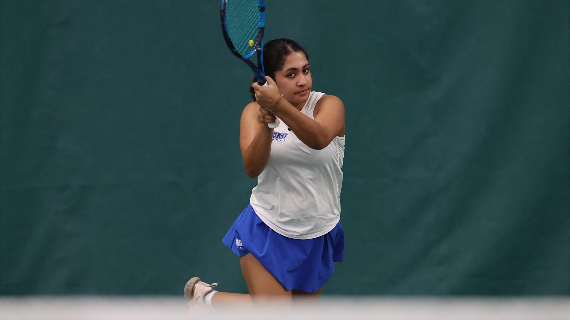 Trisha Vellanki after a backhanded swing