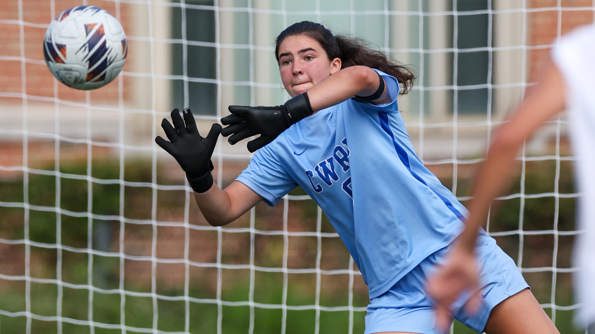 Ellie Palaian makes a diving save against Capital