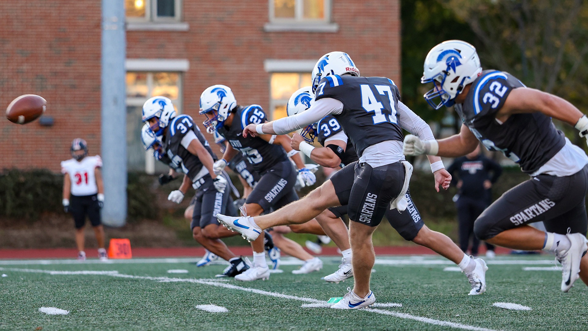 The Spartans kickoff against Washington & Jefferson