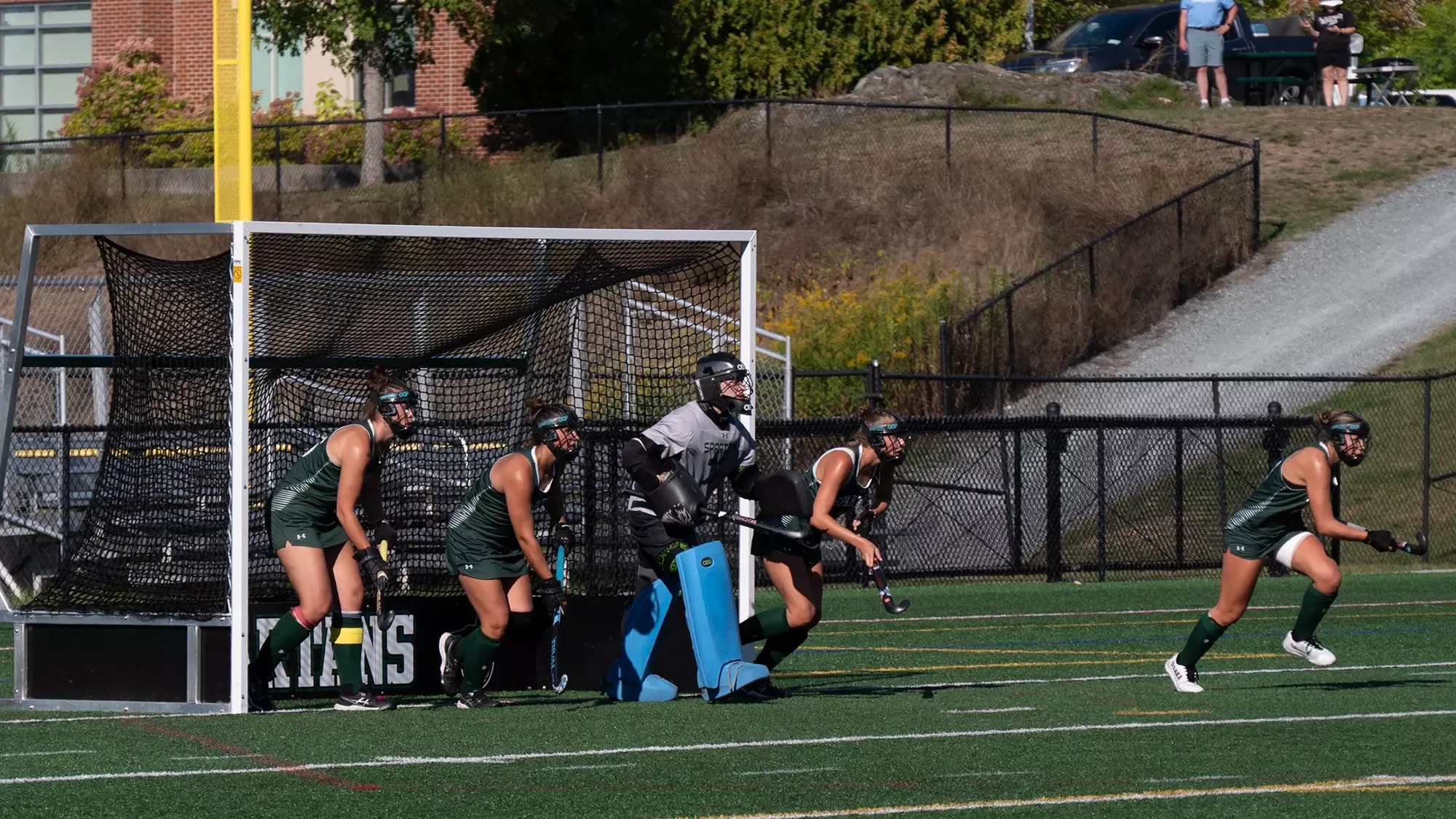 Four Spartans take on a defensive corner