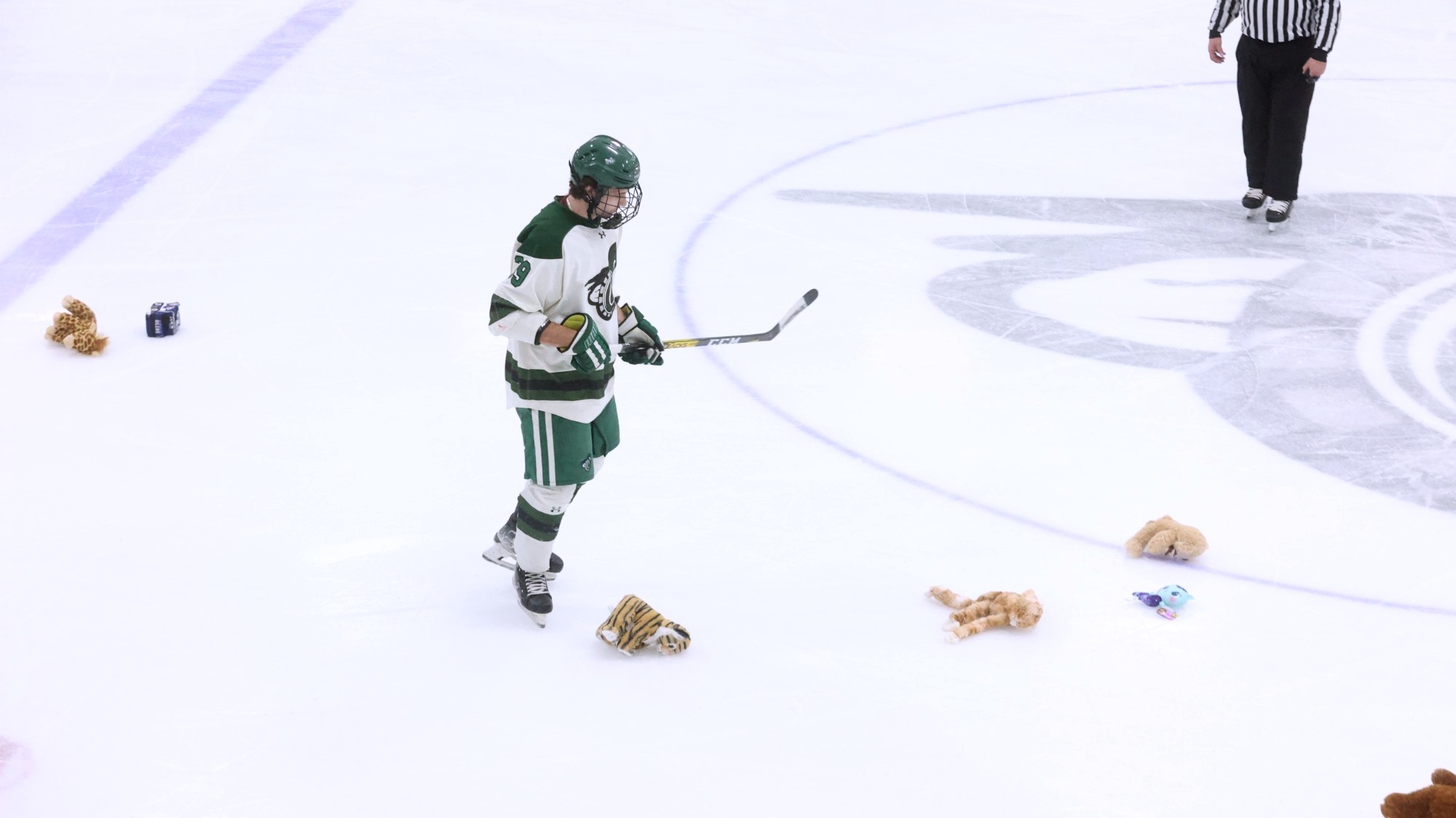 Bowditch collects stuffies on Teddy Bear Toss night