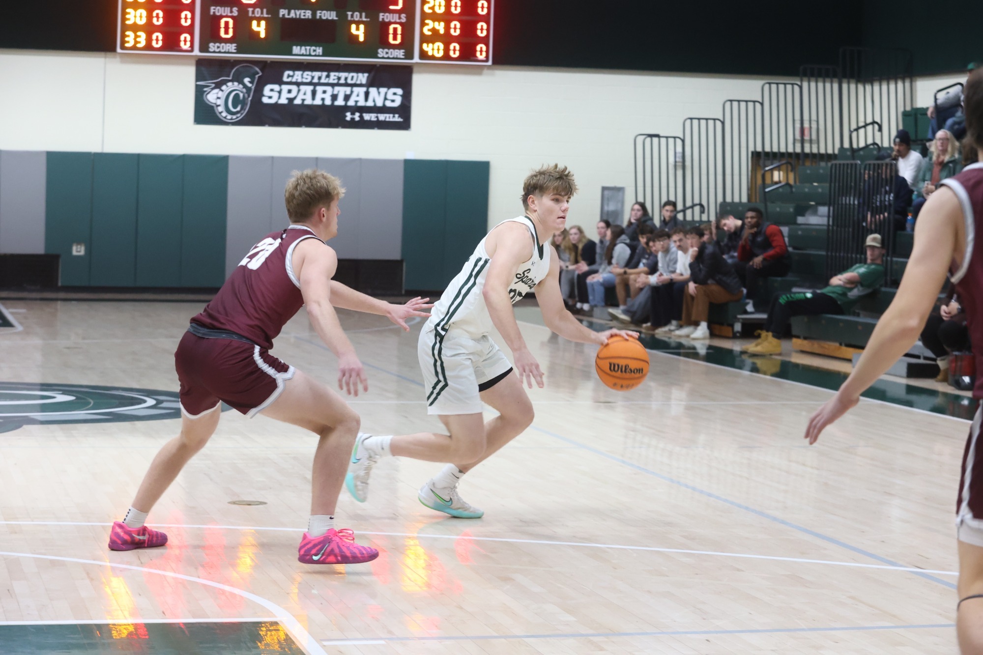 Joe Buxton dribbling past defender
