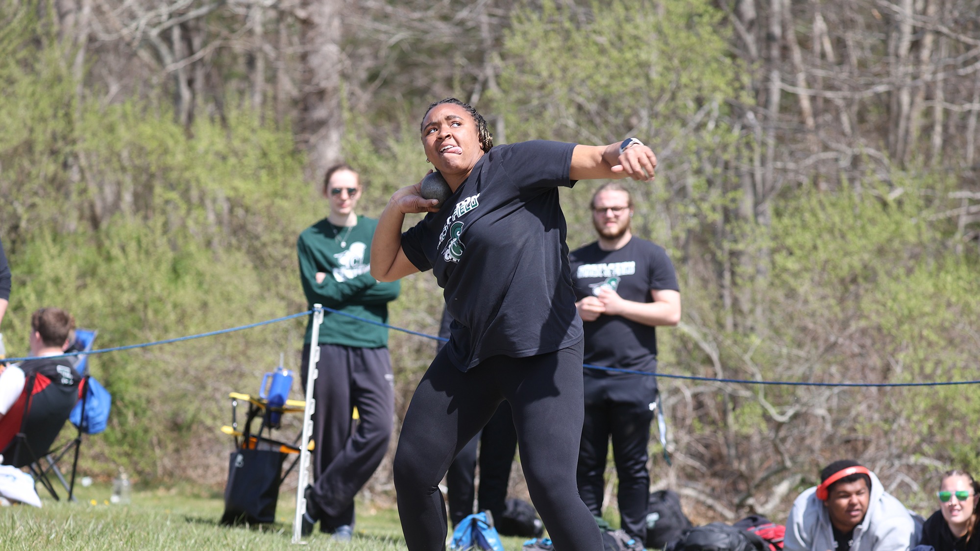 Kalynn Stevenson tossing the shot put