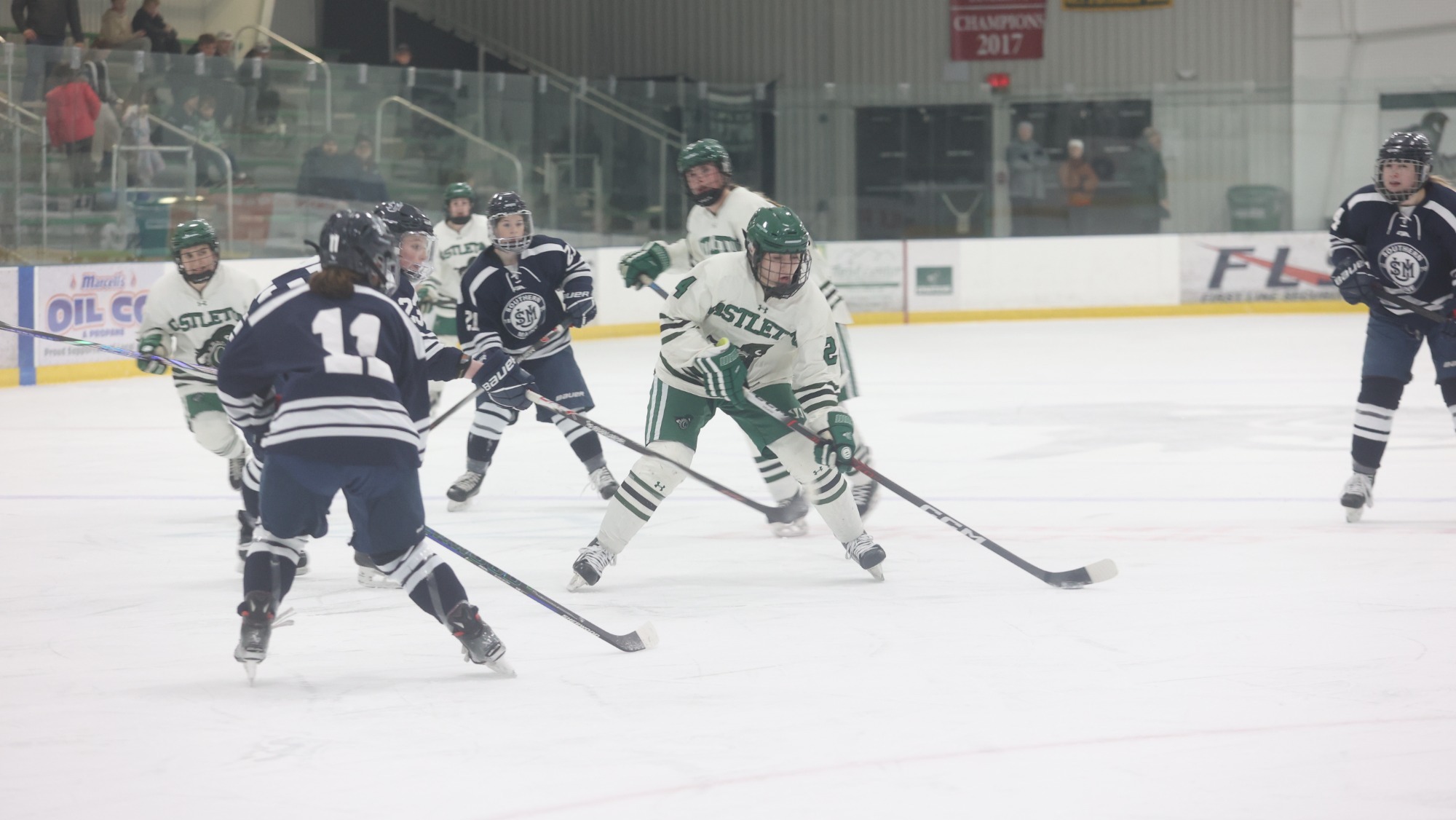 Noble skates into a crowded offensive zone