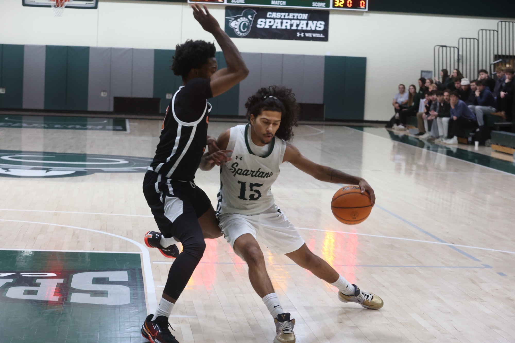 Maldonado driving towards the hoop