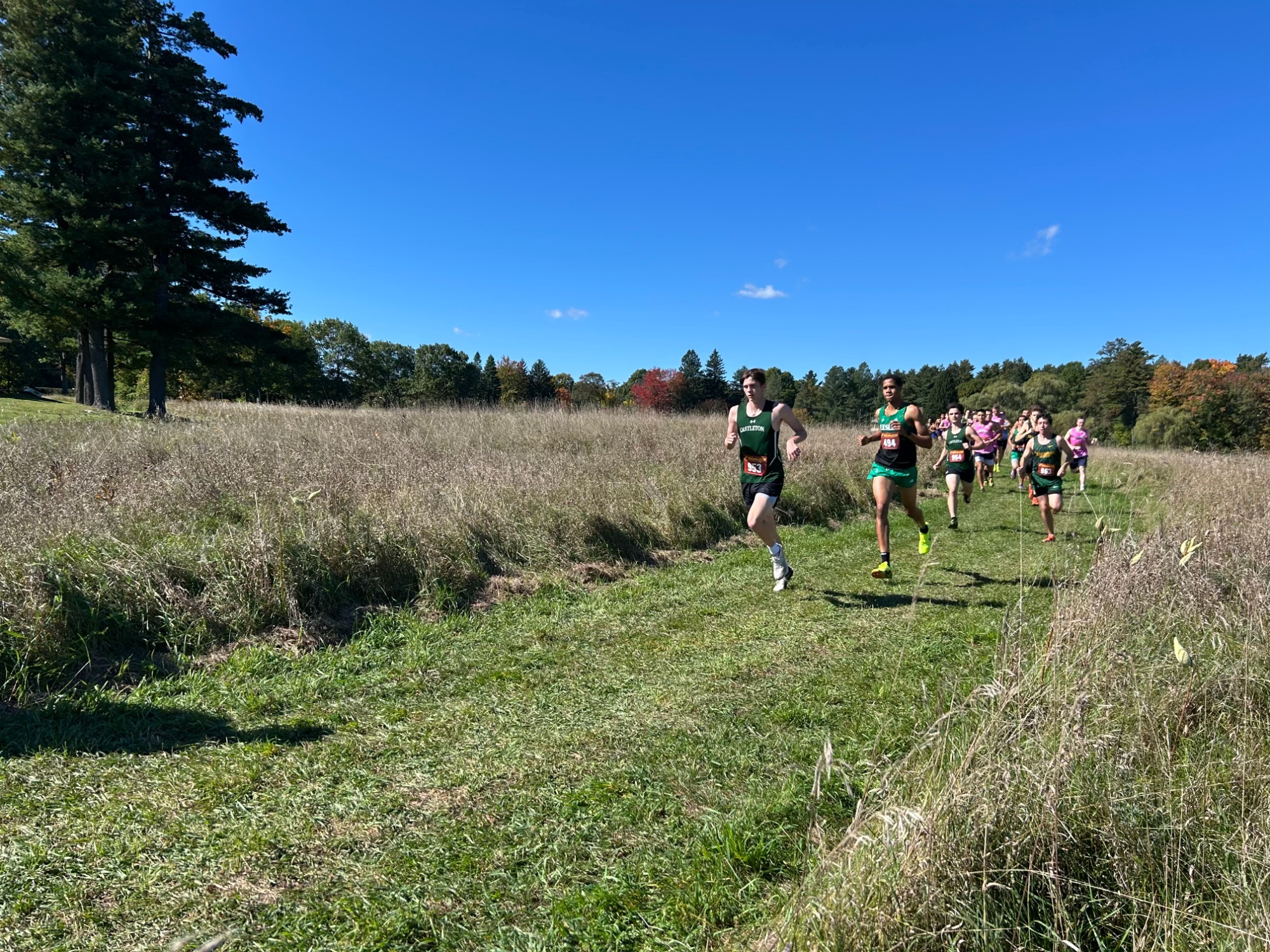 Alex Hay and Asher Lauzon running at Jim Jellison Cross Country Meet