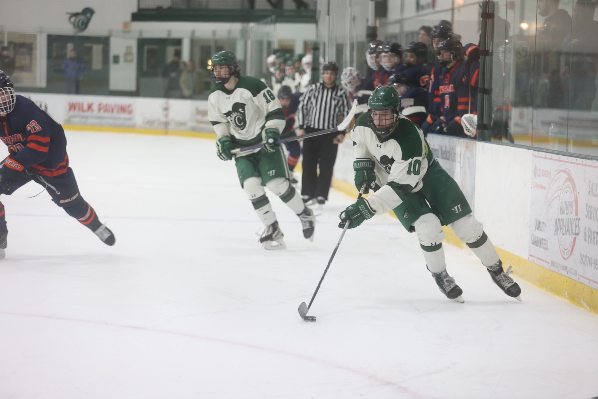 Tyler Burke carrying the puck