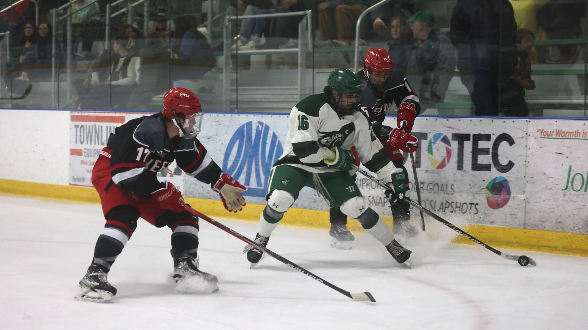 Chakrabarti getting pinched by two Keene Skaters