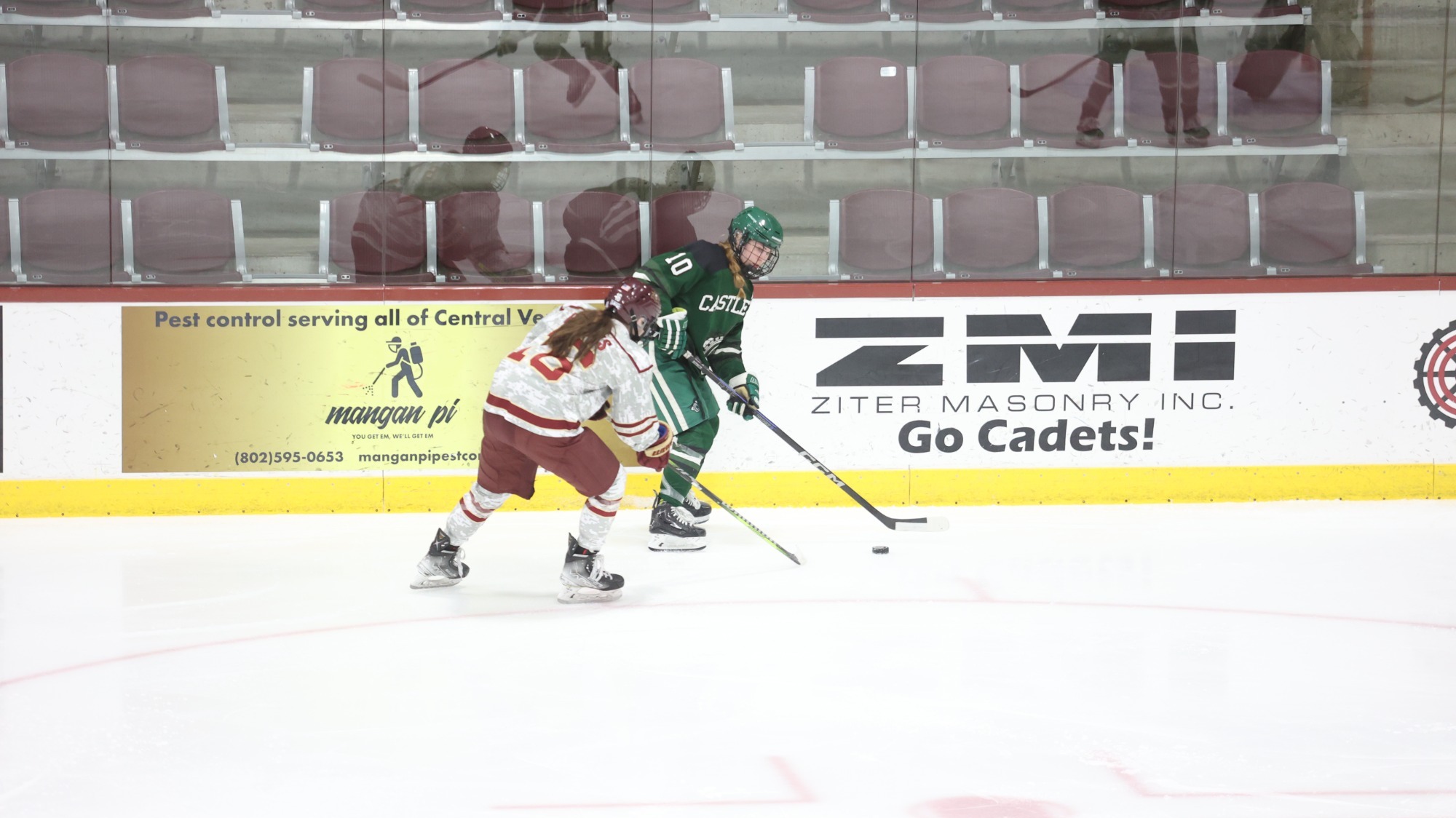 Carlsson along boards with Cadets defender