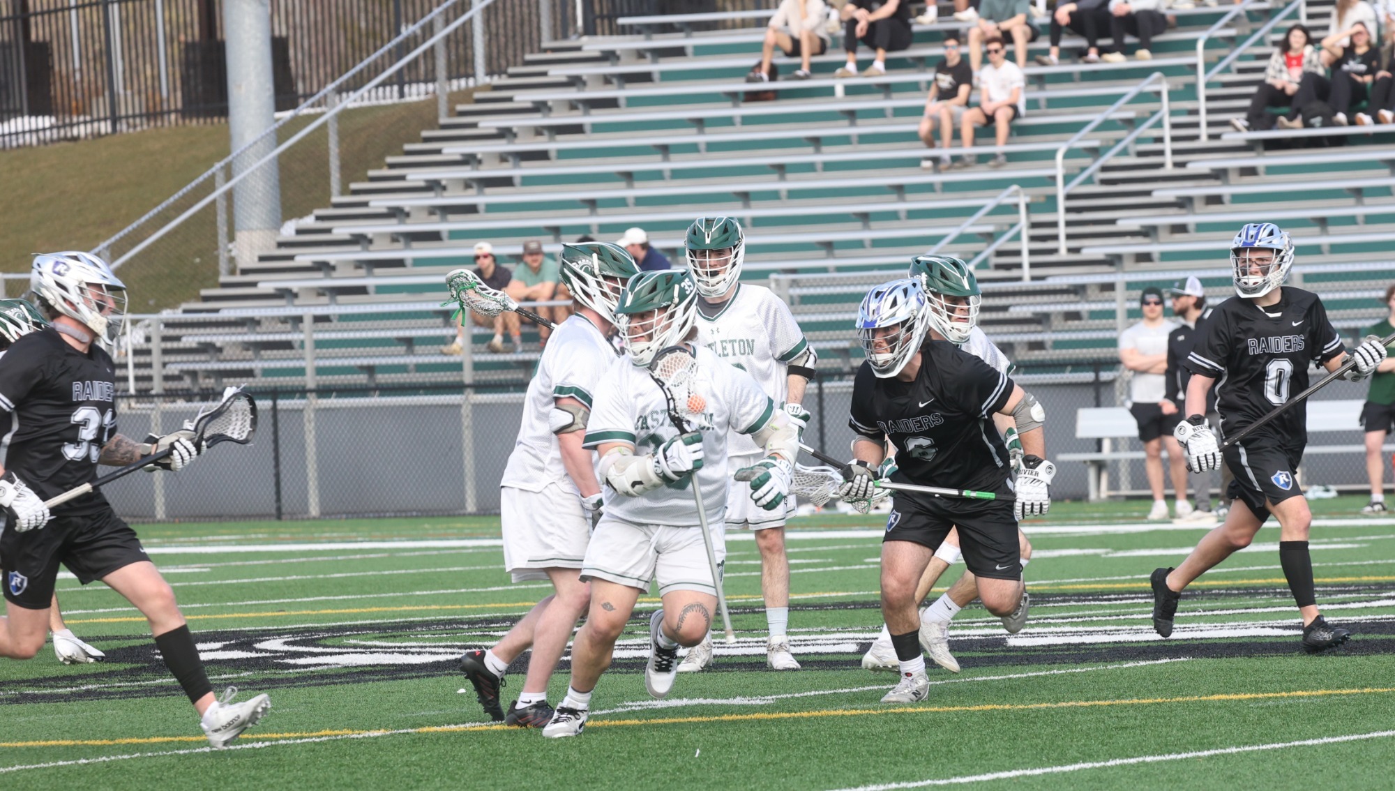 Matt Gregoire battles in a crowded midfield