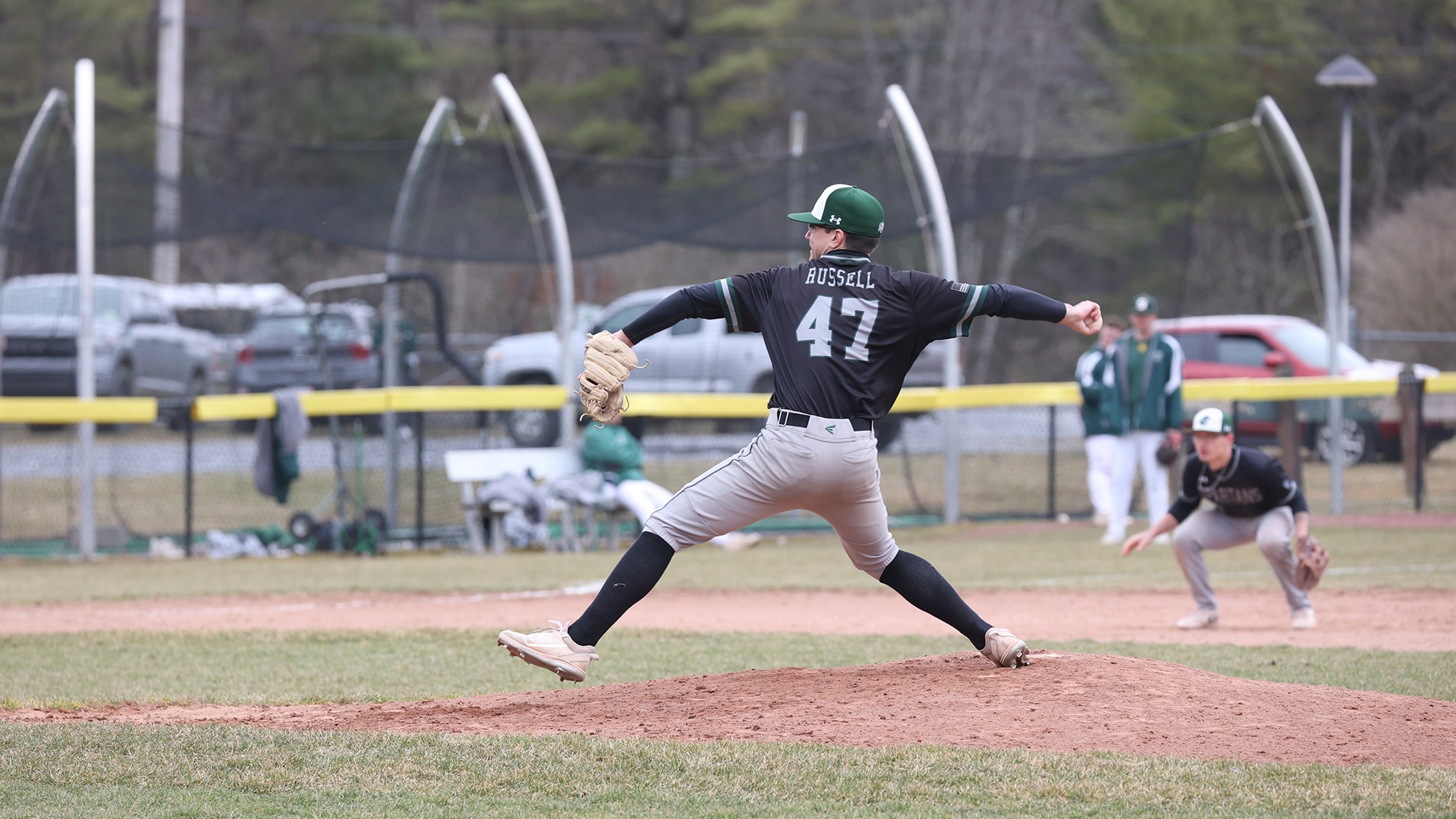 Luke Russell throwing a pitch on the mound at Skidmore